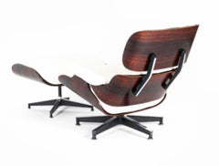 Rosewood Herman Miller Eames lounge chair and ottoman with new white leather
