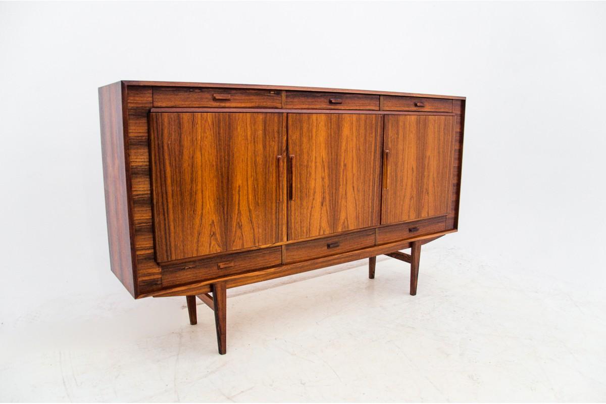 Highboard / sideboard made in Denmark in the 1960s.
Veneered with rosewood.
Very good condition, no damage.
After renovation, all surfaces polished. 
Excellent condition.
dimensions: height 119 cm width 200 cm depth 45 cm

