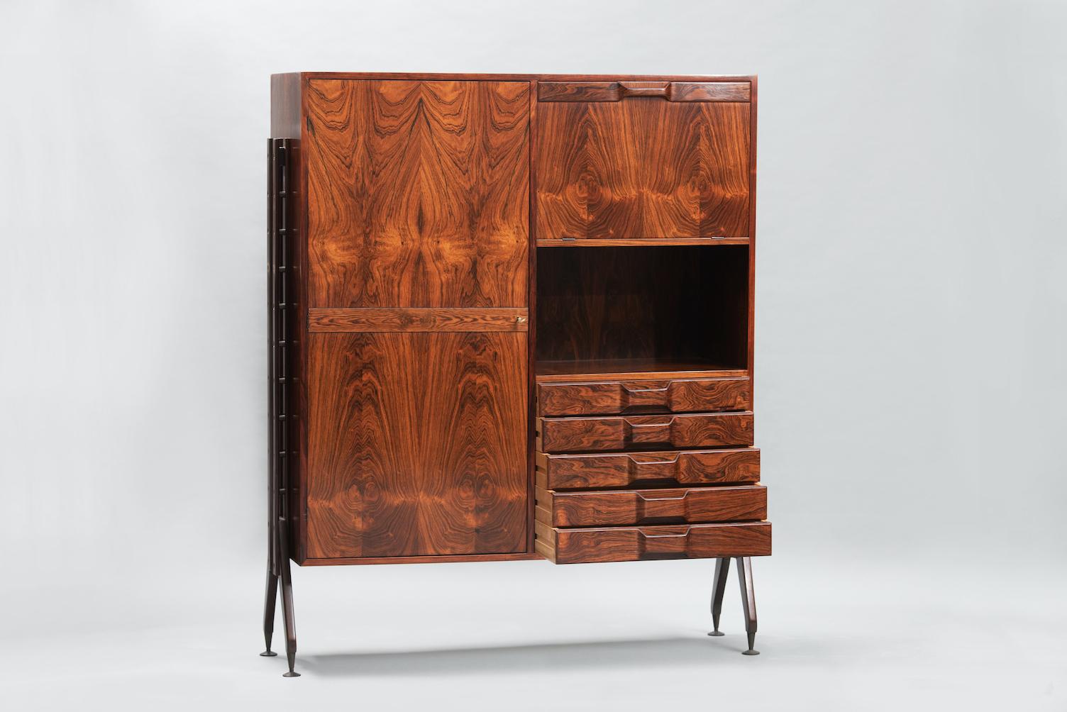 Rosewood Italian cabinet with dry bar, five drawers and shelves in the style of Franco Albini.