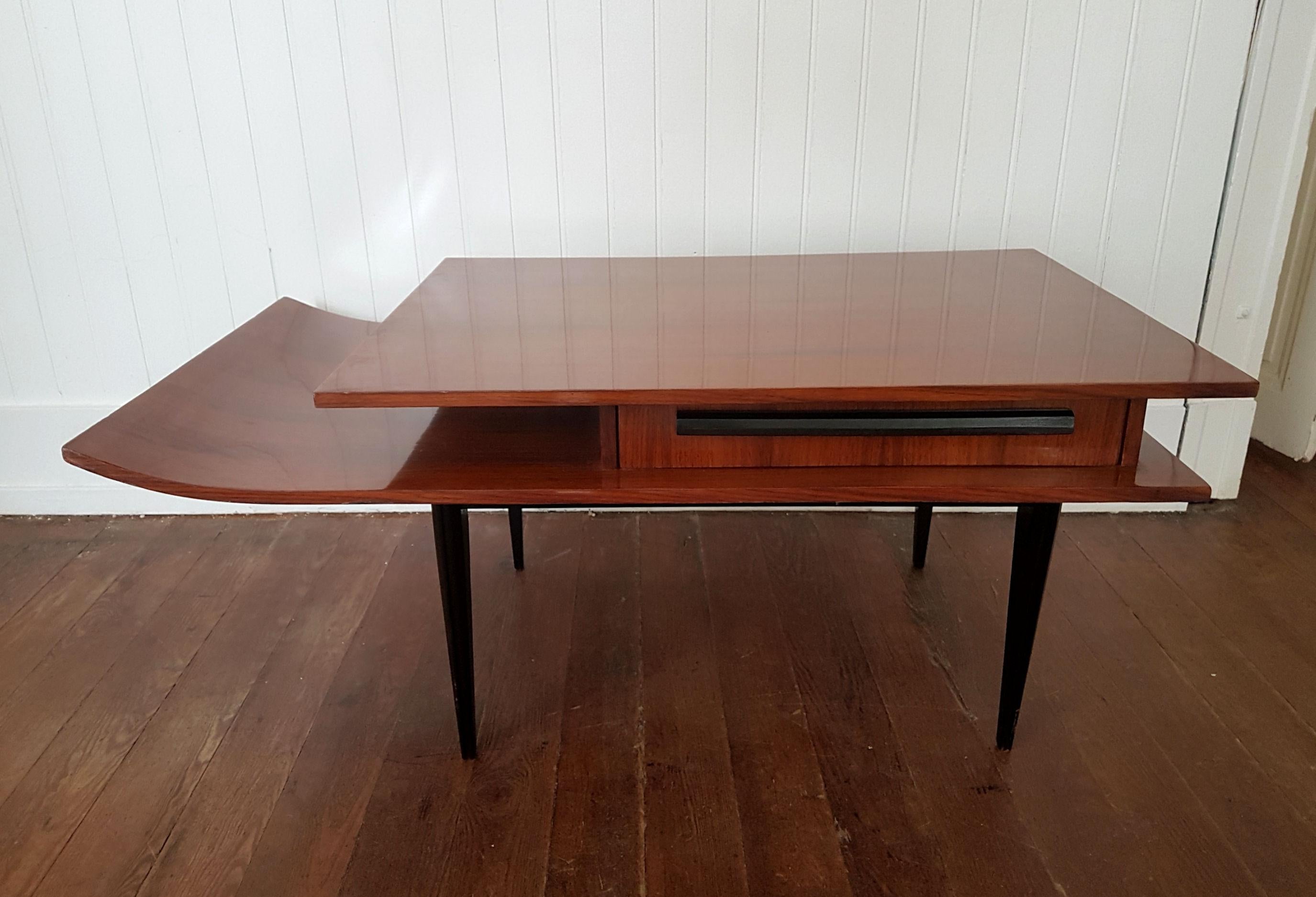 Rosewood Italian, Mid-Century Modern side table, or coffee table.
1 drawer, opening from both sides.
4 legs in wood, painted black.
No alterations or repairs,
circa 1960.
Excellent condition.