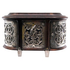Rosewood jewelry box with silver frame, cut-out garlands, lined interior