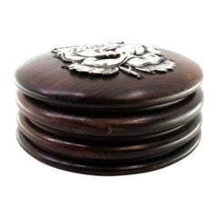 Rosewood jewelry box with silver rose appliqué on lid and lined interior