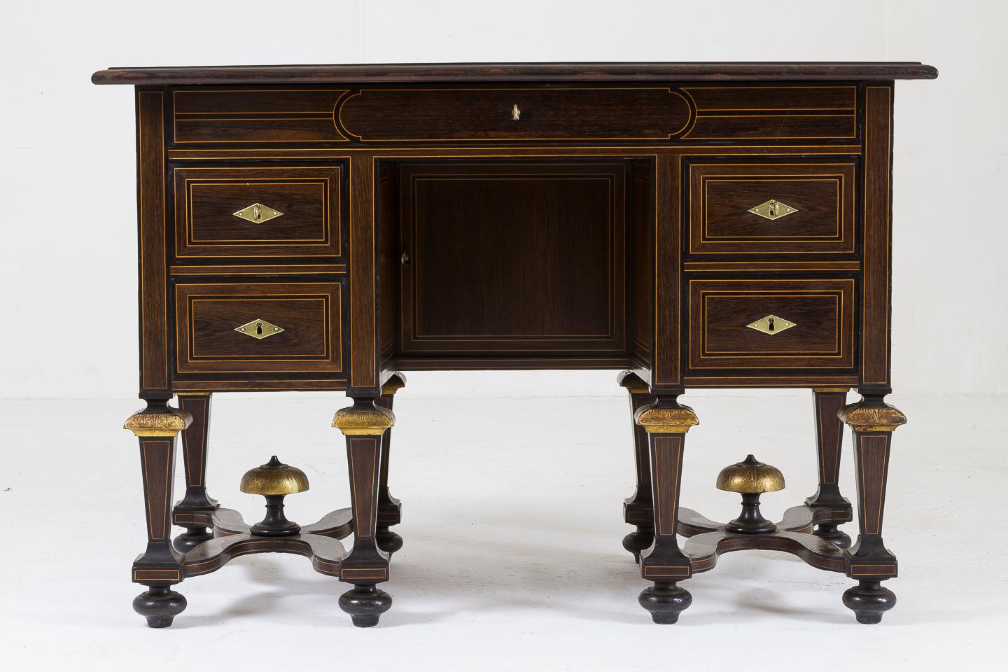 Exceptional quality 19th century French rosewood desk in the Mazarine style, with gilded finials.