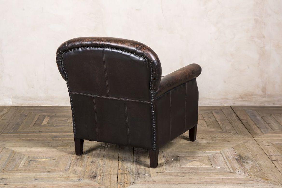 A fine rosewood leather armchair, 20th century.

The rosewood leather armchair embraces classic design and traditional period features. The armchair is extremely versatile, and makes a fantastic statement piece in a multitude of interior