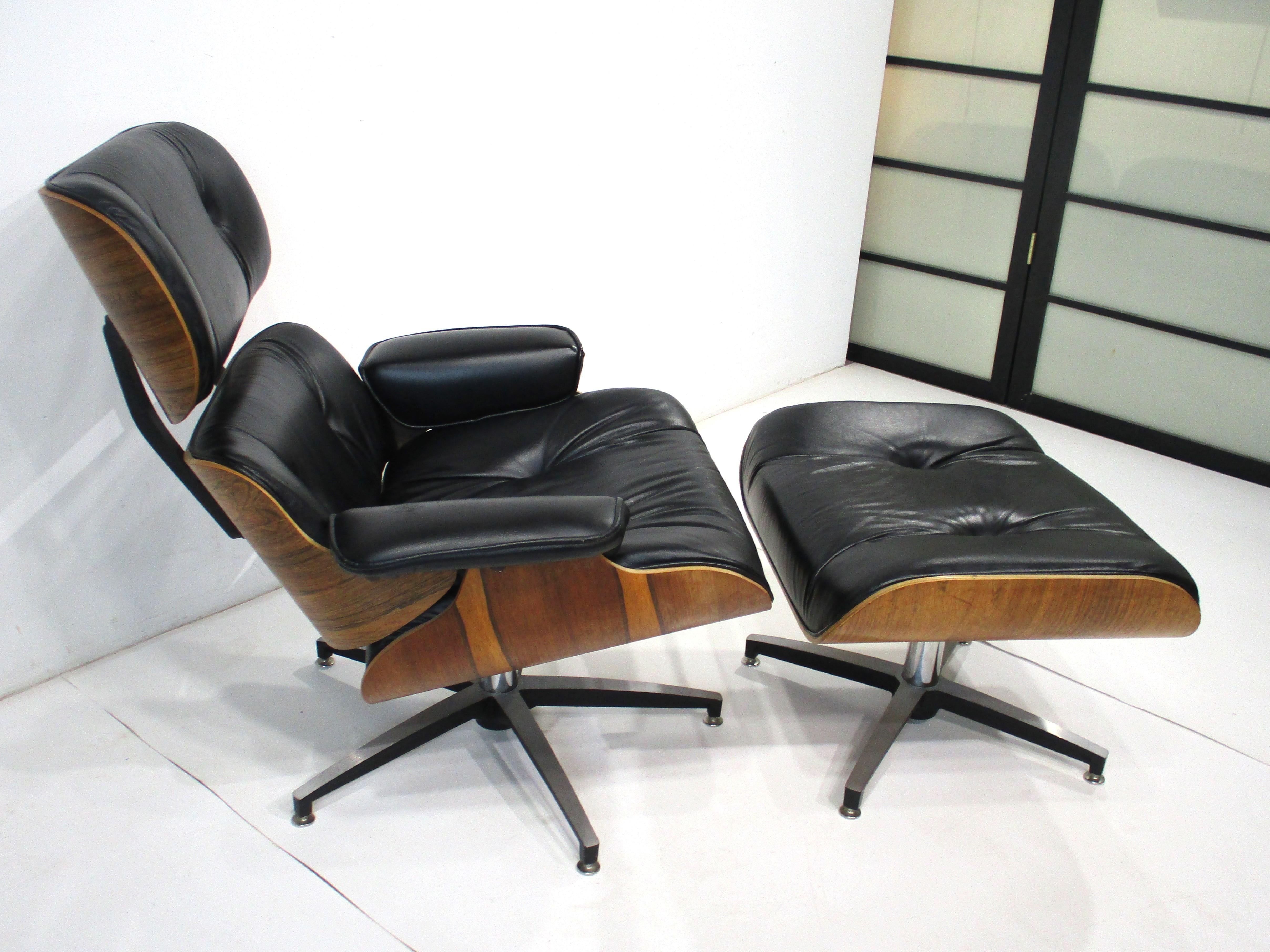 A very well made lounge chair and ottoman in a rich rosewood and soft black leather with aluminum star bases . The chair and ottoman swivel and the chair has a spring so it can rock for maximum comfort unlike the Eames 670 lounge chair . This