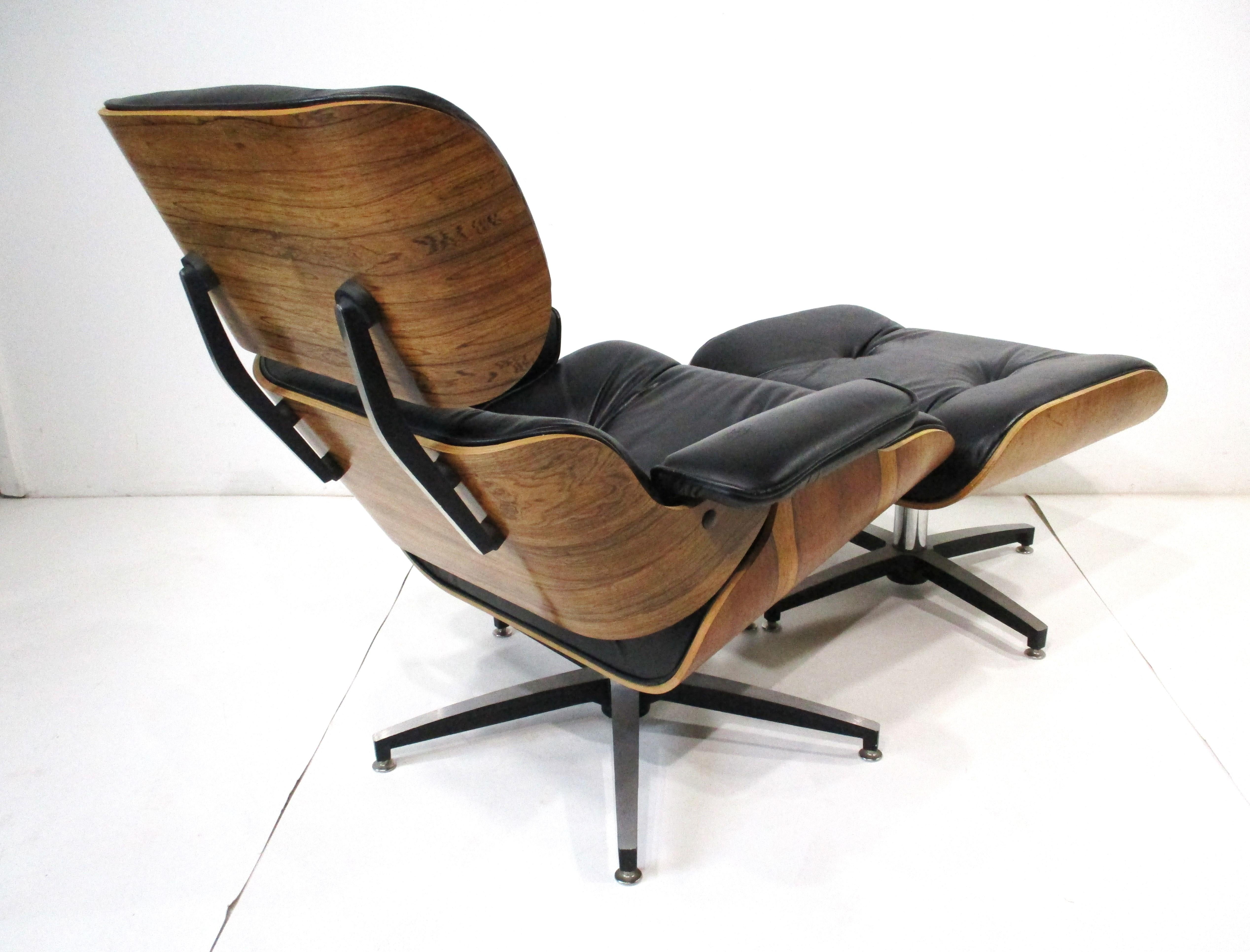 Mid-Century Modern Rosewood Leather Lounge Chair and Ottoman by Plycraft in the style of Eames