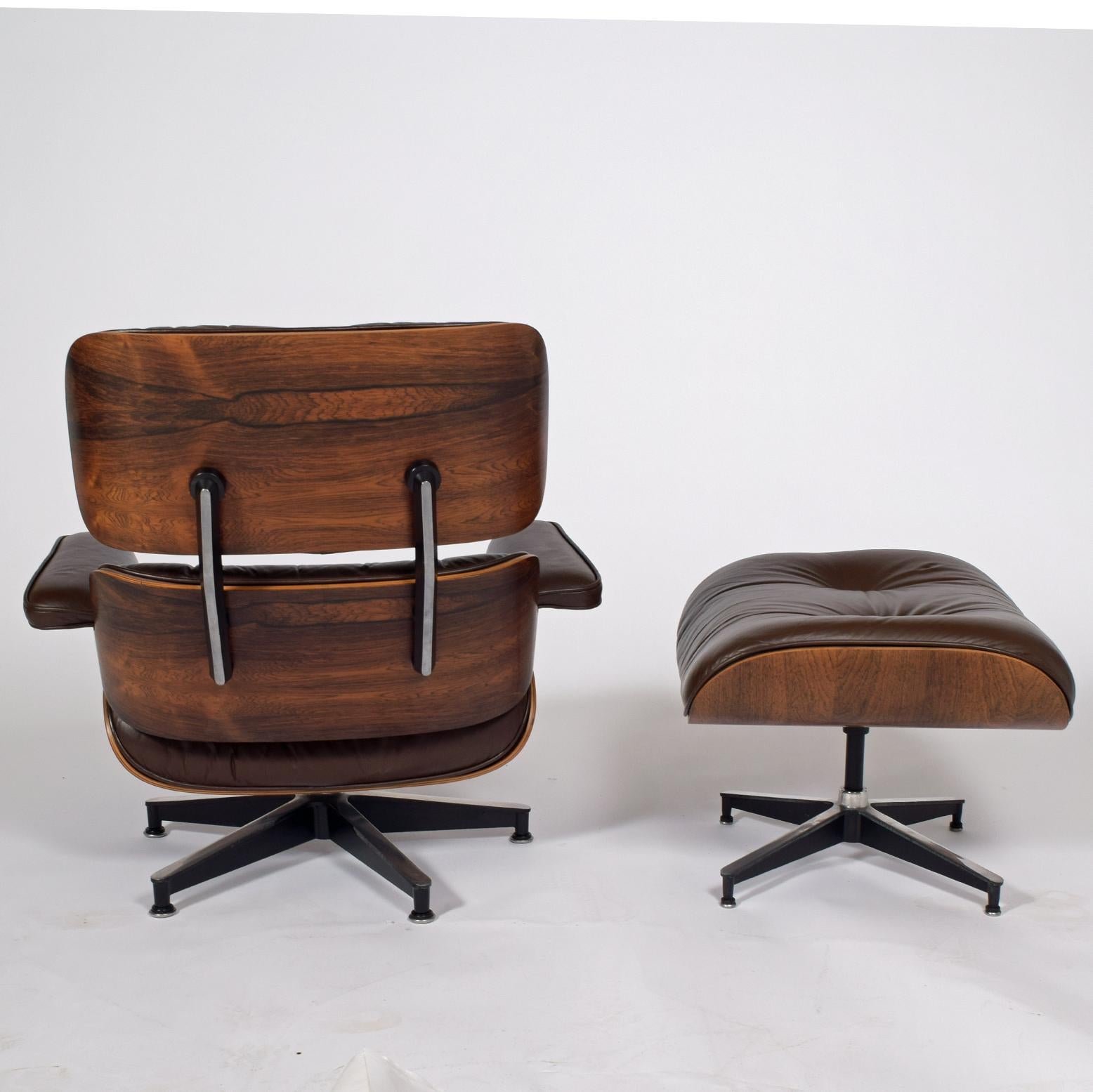 Original owner from 1970s rosewood lounge chair and ottoman 670/671 by Charles Eames for Herman Miller retain label nice original condition, reddish brown leather very nice condition.