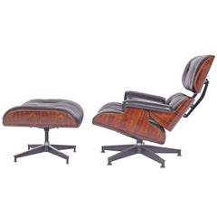 Rosewood Lounge Chair and Ottoman 670/671 by Charles Eames for Herman Miller