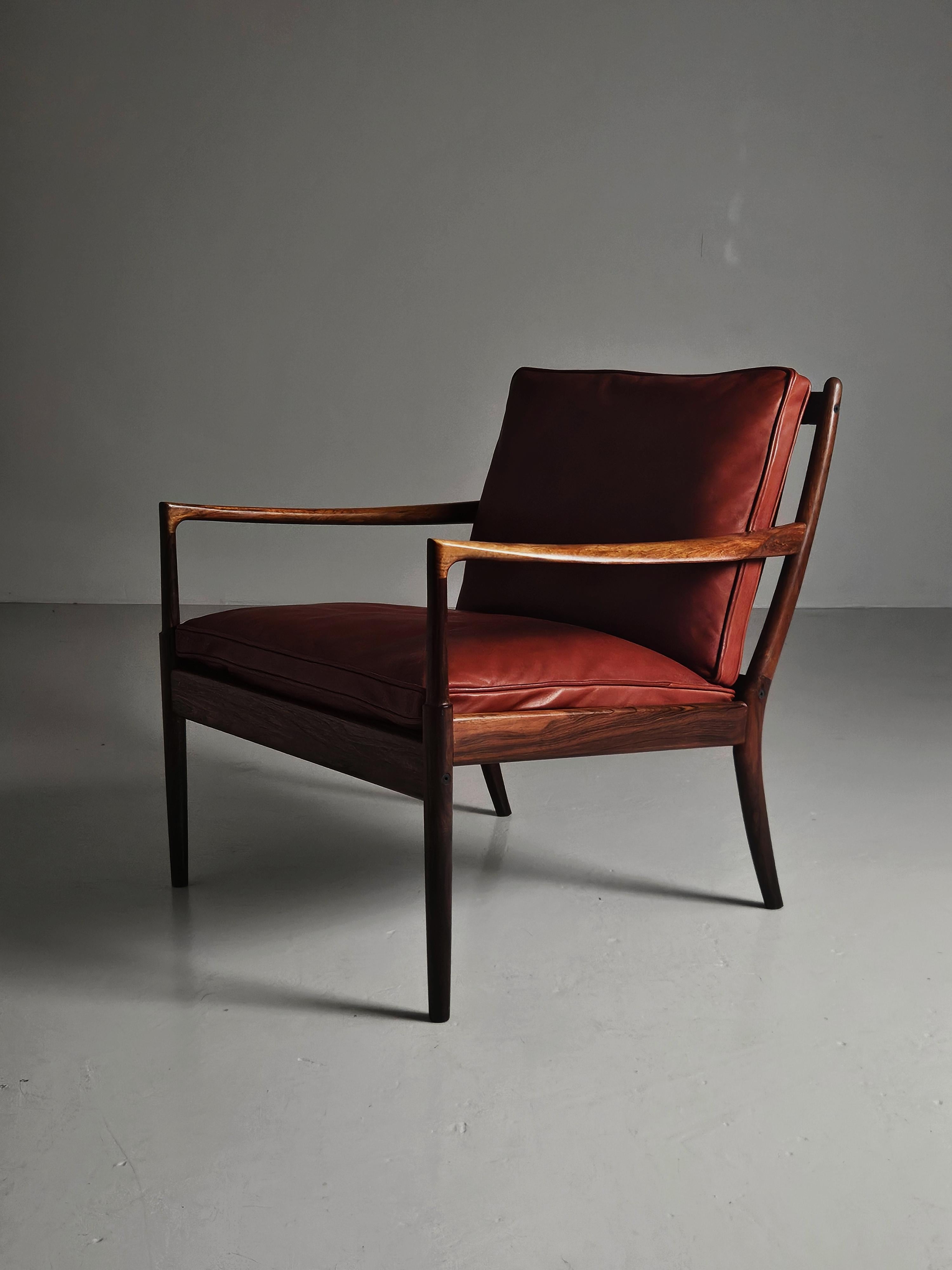 Rare 'Samsö' chair by danish designer Ib Kofod-Larsen for OPE Möbler, Sweden, during the 1950s. 

Beautiful slim design in rosewood with cushions of premium leather. 

