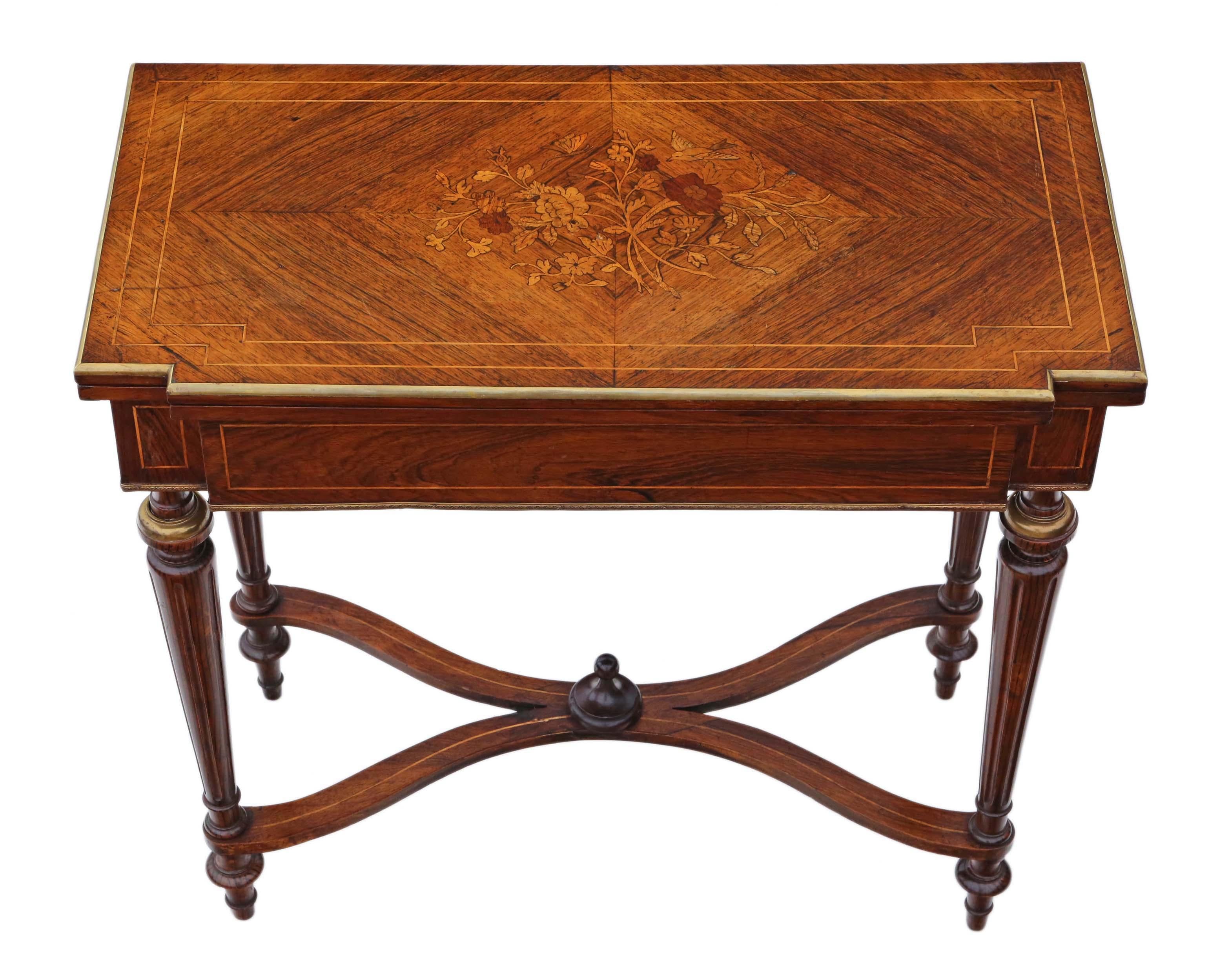 19th century rosewood marquetry folding card or tea table. Inlaid brass edging and decoration.
Solid and strong, with no loose joints. Full of age, character and charm.
Would look great in the right location! A very good quality table with a great