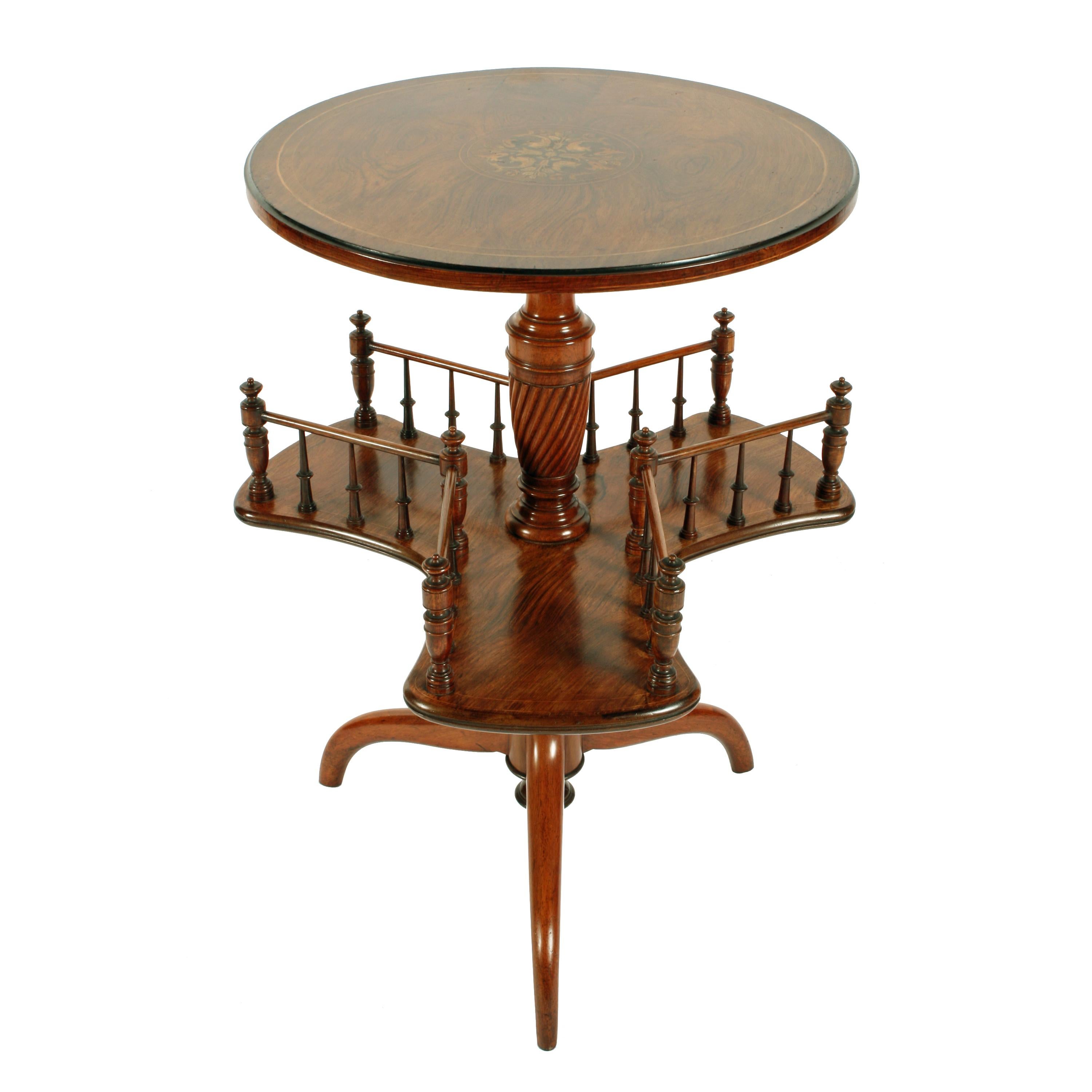 Rosewood marquetry inlaid book table


A 19th century rosewood book table with a marquetry inlaid top.

The table has a circular top that has a marquetry inlaid decoration in the centre and is box wood strung.

Below the top is a revolving