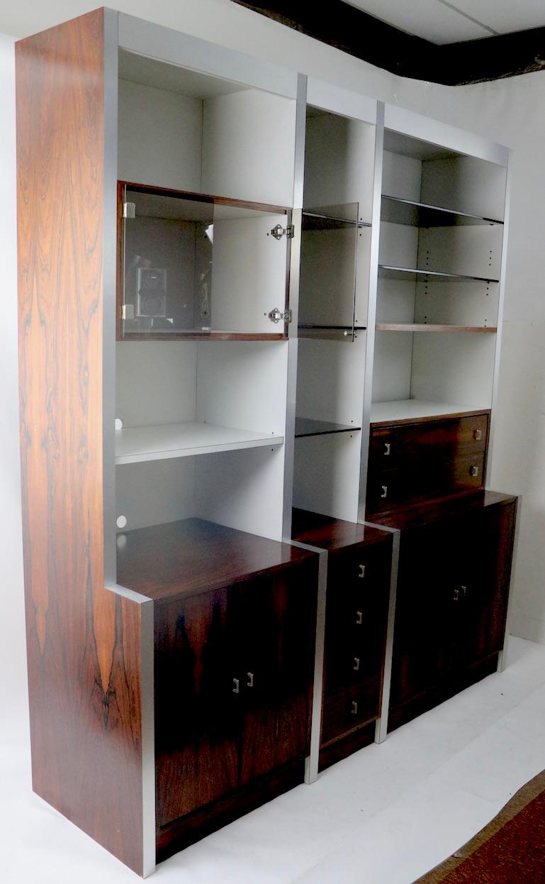 Rosewood Metal Glass and Formica Wall Unit Baugnman Attributed for John Stuart For Sale 11