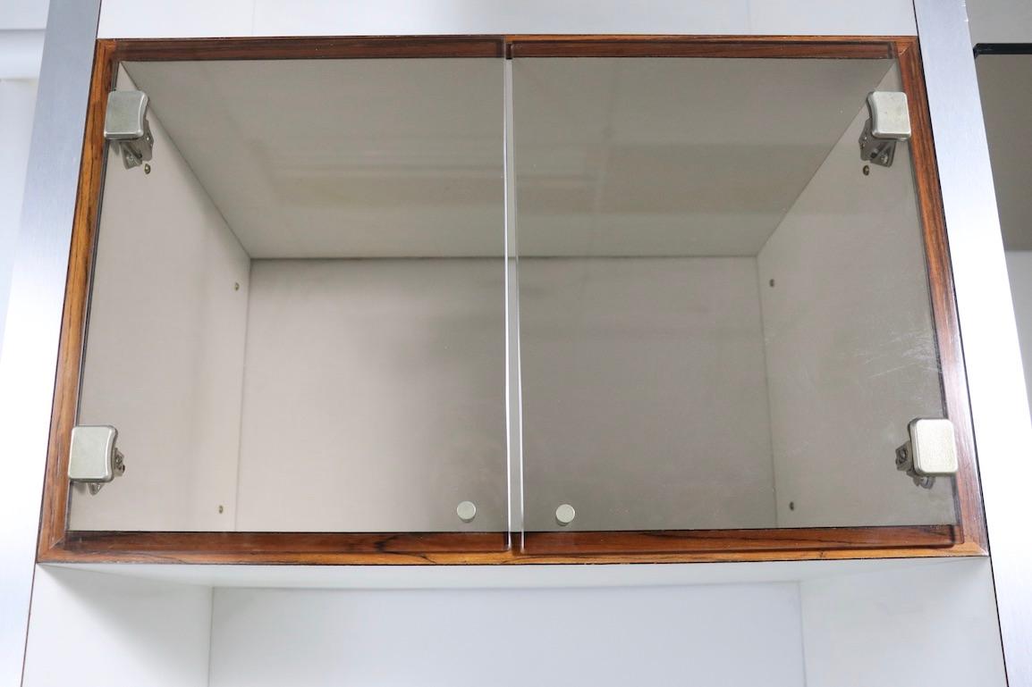 Mid-Century Modern Rosewood Metal Glass and Formica Wall Unit Baugnman Attributed for John Stuart For Sale