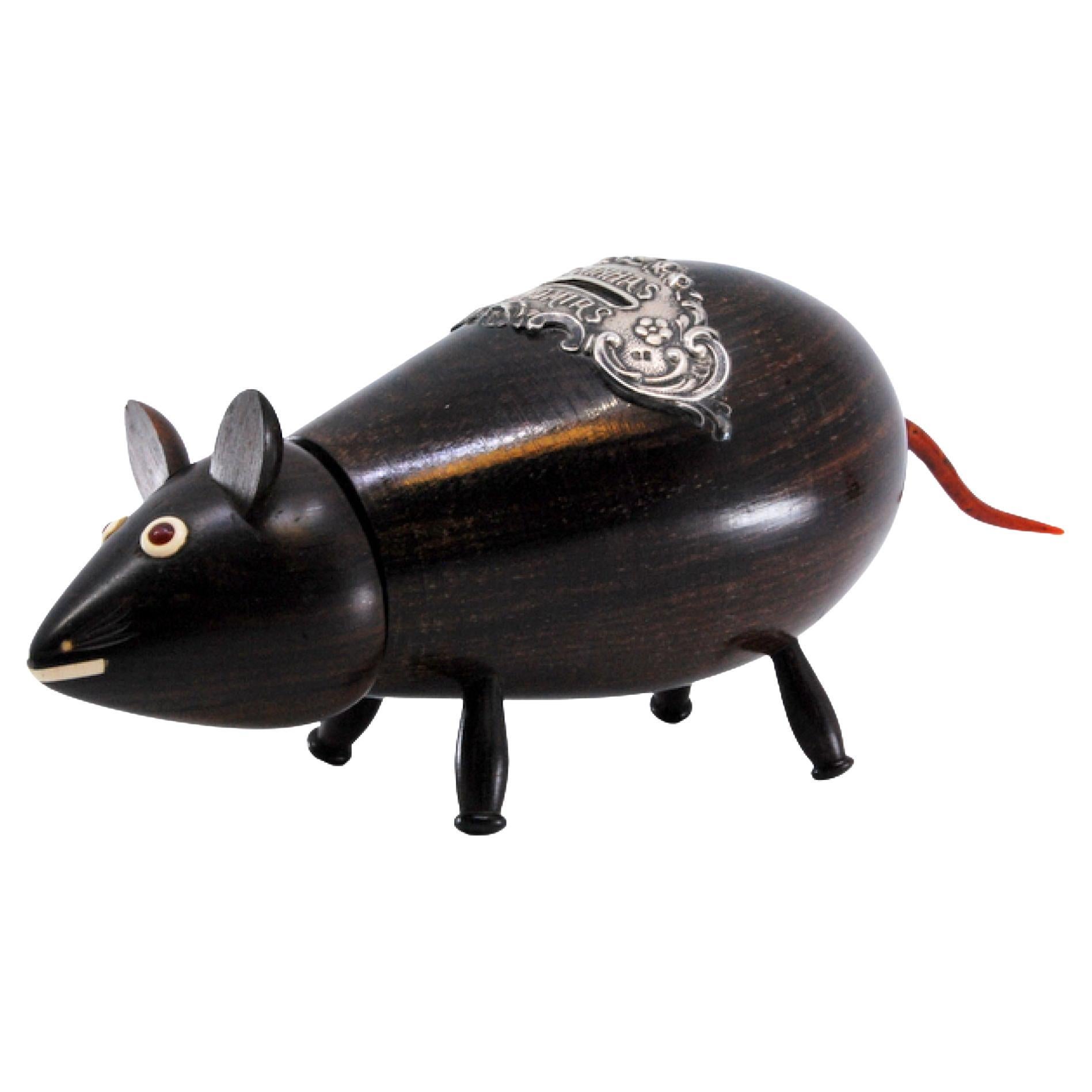 Rosewood mouse-shaped piggy bank with silver accents and “My savings”