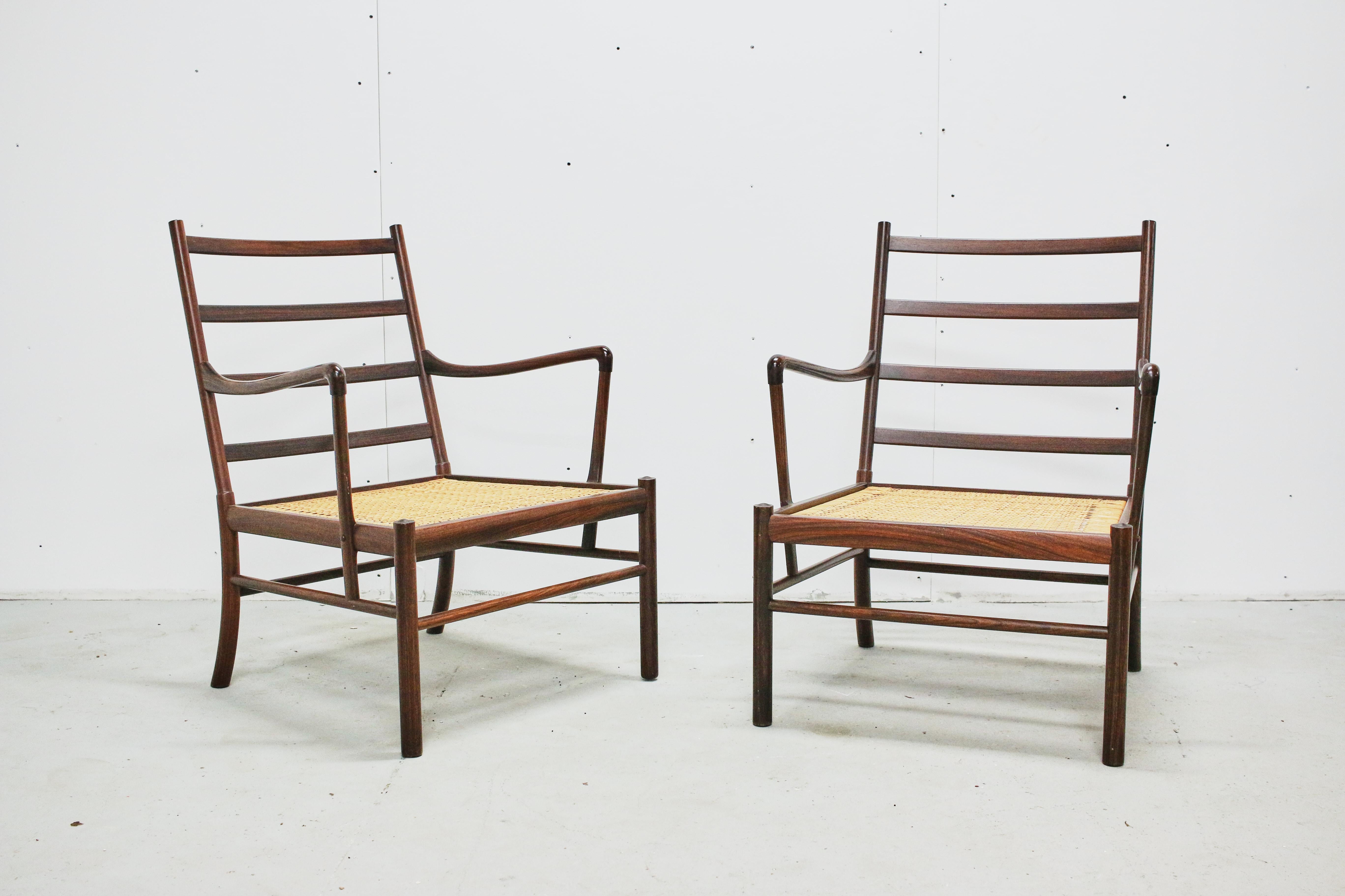 A stunning and rare pair of rosewood Ole Wanscher Colonial chairs, produced by P. Jeppesens Møbelfabrik in Denmark, 1960s. In very good original vintage condition. Wonderful rosewood grain.
  