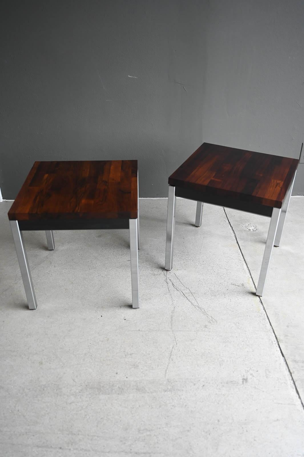 Rosewood Parquet Side Tables by David Parmelee for Founders, ca. 1970.  Beautiful rosewood parquet tops with shiny chrome bases and black trimmed edging.  Good original condition with only slight wear as shown to one edge and slight separation on