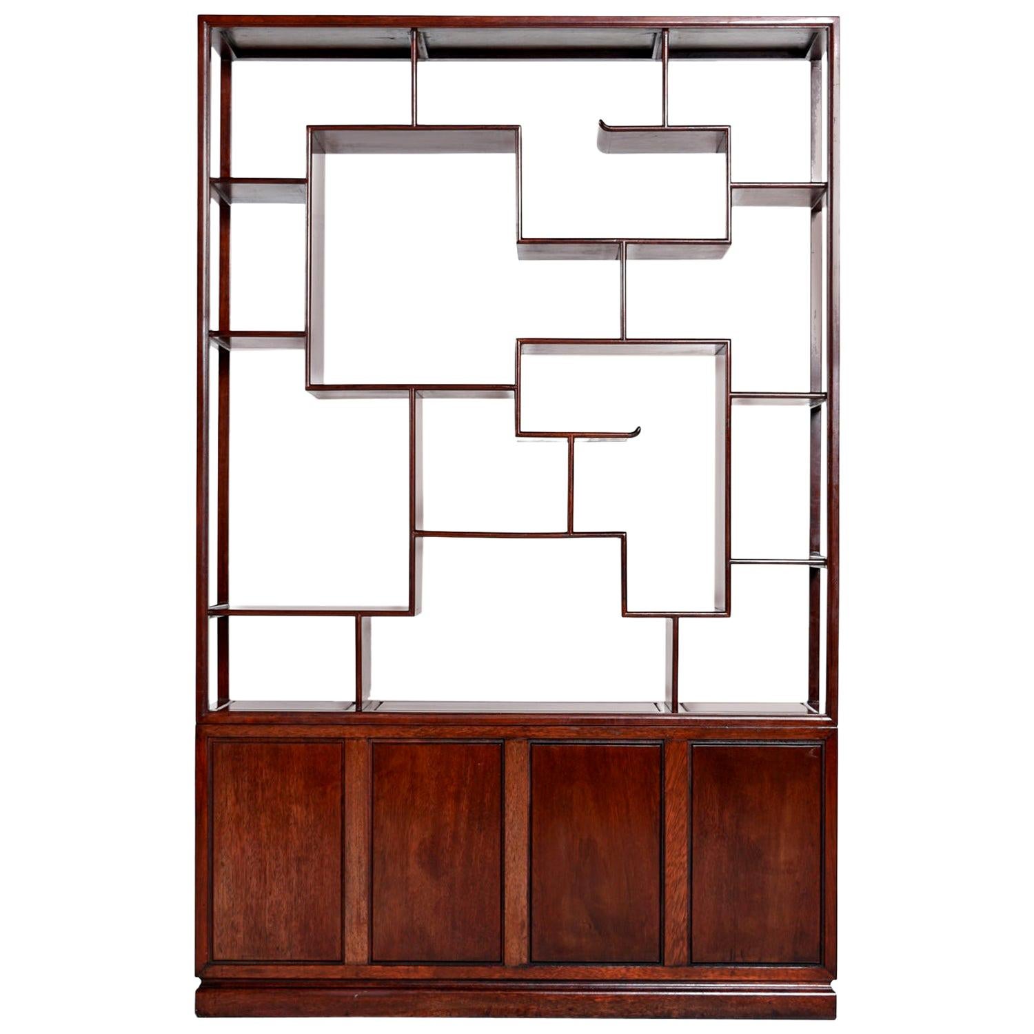 Gorgeous Asian modern chinoiserie open two-piece solid rosewood wall unit room divider. Stands on its own and is finished on both sides, so it can act as a room divider. The bottom section offers open cabinet space with shelves behind beautifully