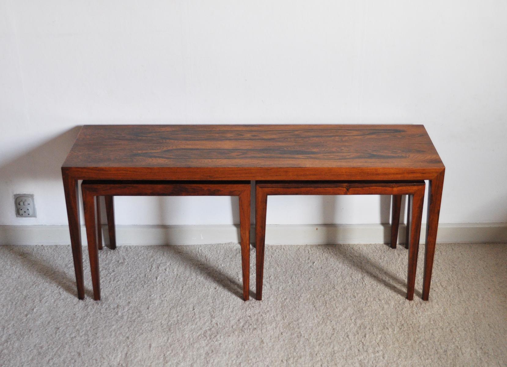 Beautiful set of one large table and two nesting tables made in Brazilian rosewood. Designed by Severin Hansen Jr. in the 1960s and manufactured by Haslev Møbelsnedkeri in the same period. Model the no. 41B, labeled.

Good vintage condition, signs