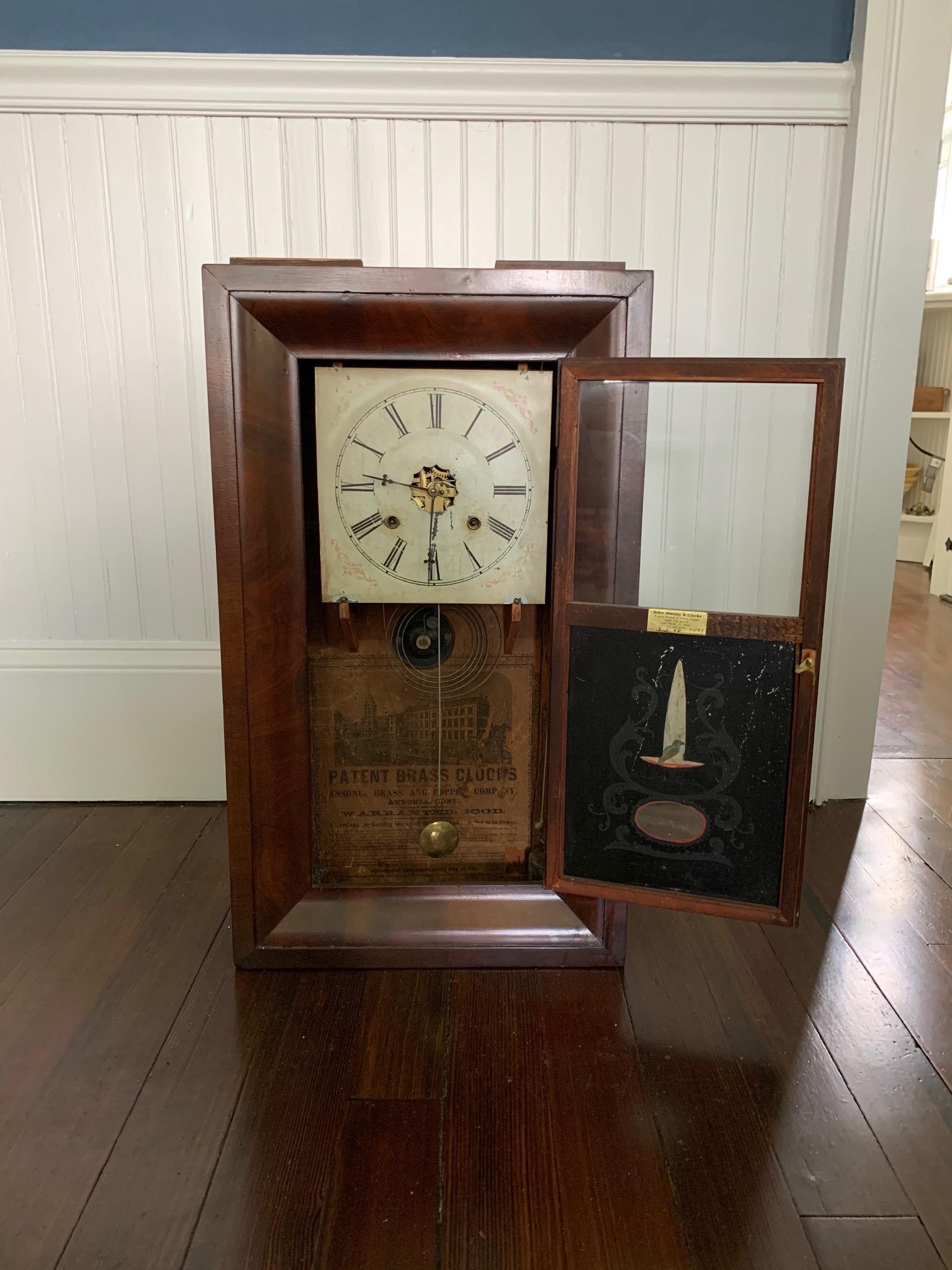 Rosewood shelf clock by Ansonia Clock Company. Brass & copper, 19th century.

Original signed and painted dial.

An Ansonia brass and copper Co, calendar shelf clock, painted tin dial with stamped brass surround, marked Terry's Patent.