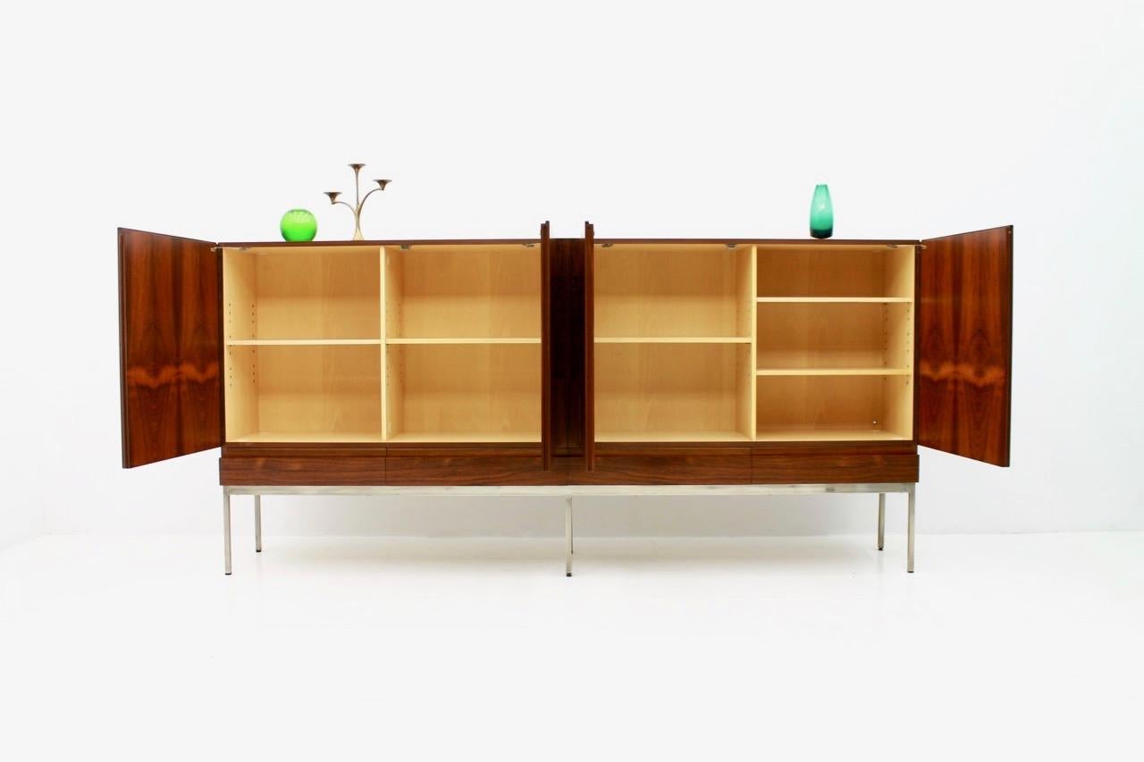 Very nice Highboard B60 by Dieter Waeckerlin for Behr. The frame is nickel-plated. The sideboard was designed 1958 and manufactured by Behr 1962. The sideboard is in a very good condition.
Measures: W 248 cm, H 119 cm, D 43 cm.
  