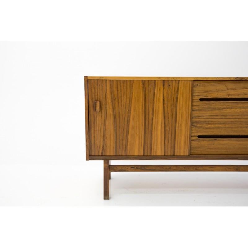 1960s rosewood sideboard with two sliding doors and four center drawers, designed by Nils Jonsson for Troeds. Model 