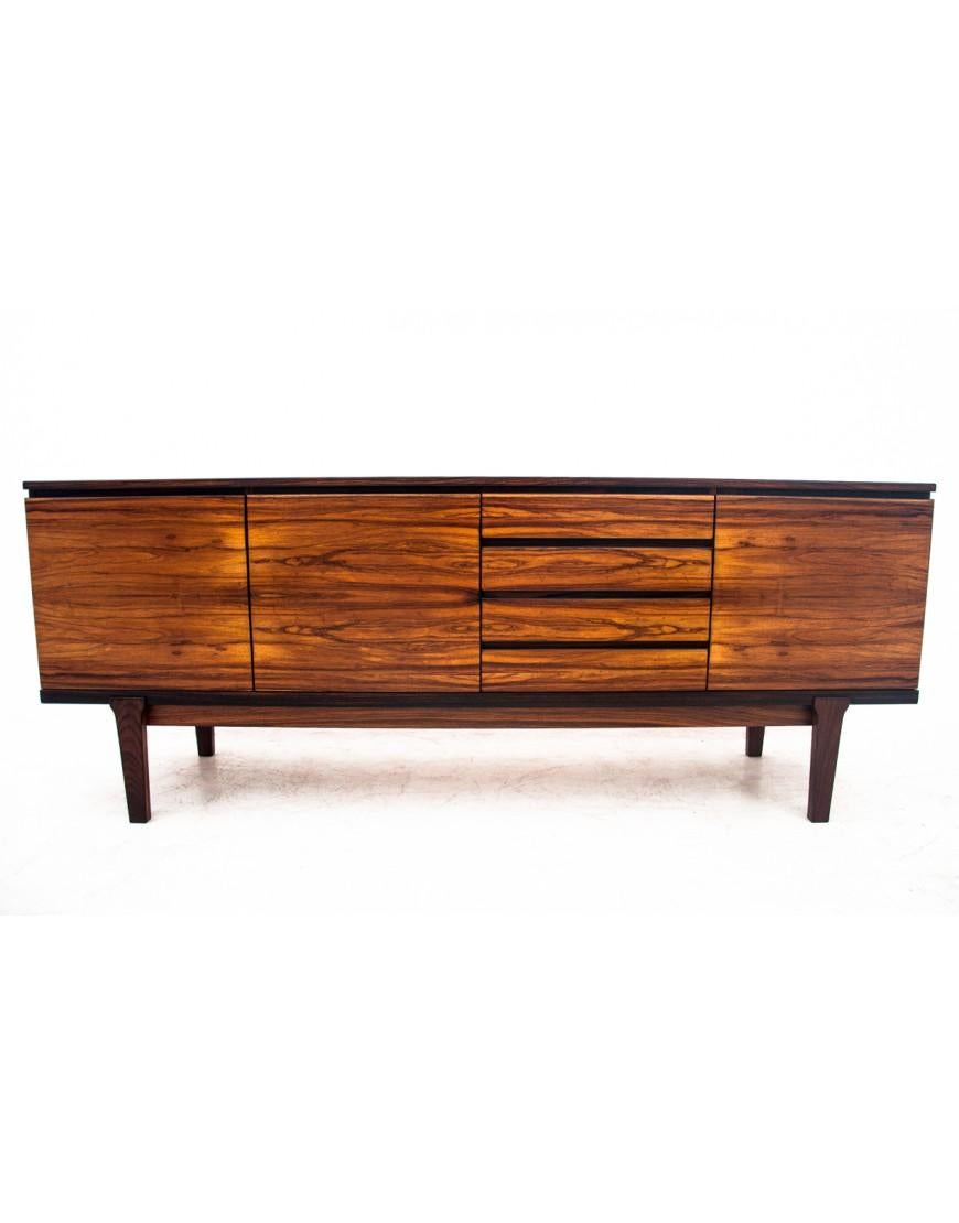 Oblong sideboard chest of drawers made of rosewood.

Original chest of drawers made in Denmark in the 1960s.

Chest of drawers after professional wood renovation.

Perfect for Scandinavian, midcentury modern and vintage interiors.

height 78 cm,