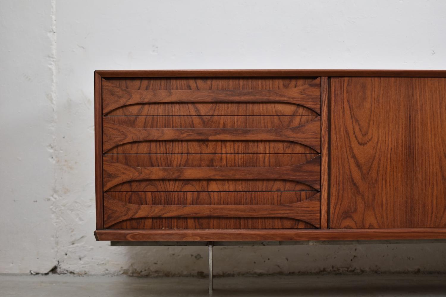 Sideboard designed by Oswald Vermaercke for V-Form, Belgium, 1950s. This piece is made out of rosewood and has a custom made metal frame. On the left a four drawer section, on the right two doors revealing an open storage compartment with a shelf.