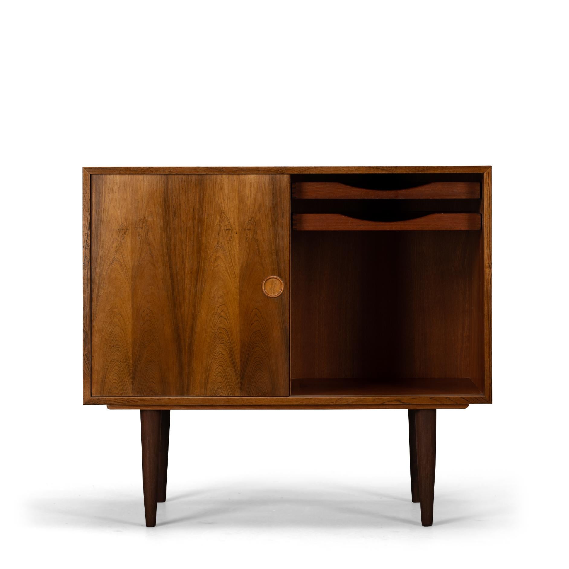 Small sideboard by Kai Kristiansen
Danish design by Kai Kristiansen and produced by FM Mobler. FM is short for Feldballes Møbelfabrik that had the fortune to have succesful designer Kai Kristiansen on their side in the 50s and 60. This sideboard has