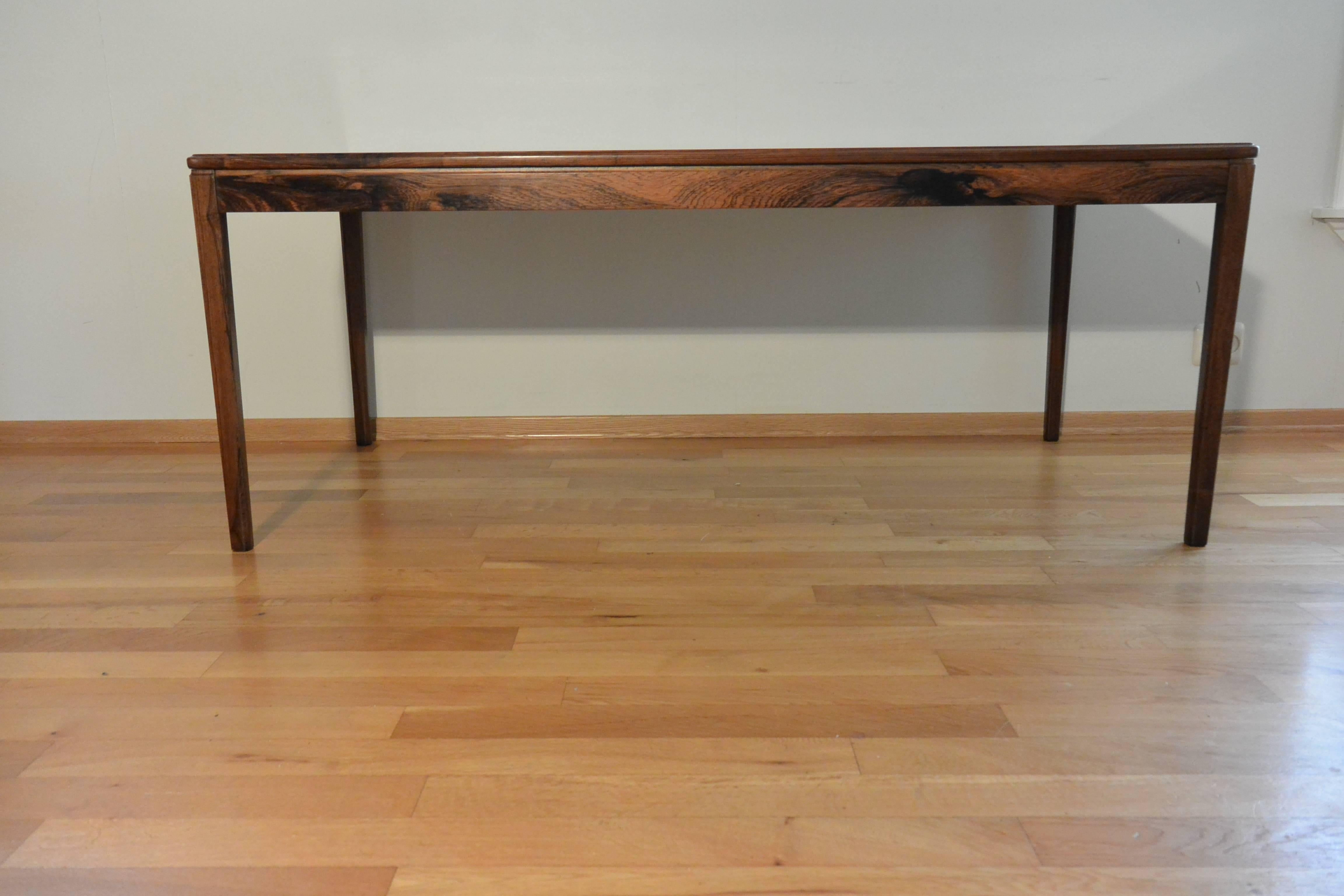 Manufactured in Norway in the 1960s this beautiful rosewood table can be placed in a lounge, office, hallway as a side table, sofa table or coffee table. The table is unmarked/unlabelled is Afdal from Haug Snekkeri, has similar washing/ care label