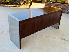 Rosewood & Stainless Credenza by Roger Sprunger/Dunbar