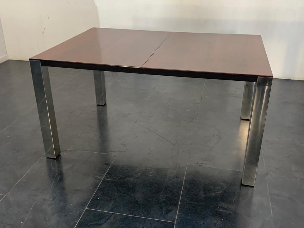 Rosewood & Steel Dining Table, 1970s
Packaging with bubble wrap and cardboard boxes is included. If the wooden packaging is needed (crates or boxes) for US and International Shipping, it's required a separate cost (will be quoted separately).