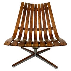 Silla de salón giratoria de palisandro de Hans Brattrud para Georg Eknes