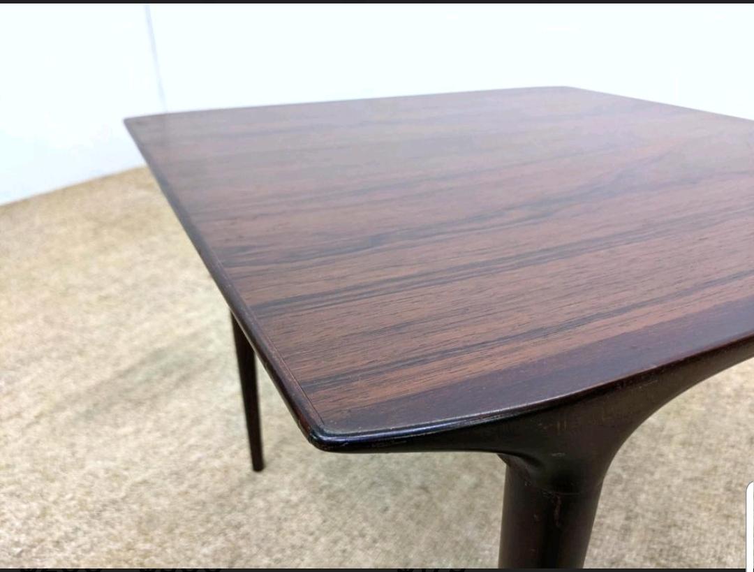 This is a beautiful and stunning rosewood table by Kofod Larsen for Seffle Moller of Sweden. Created the 1960s and signed on the underside. Perfect size for a side table, coffee table or to be set between a pair of chairs.