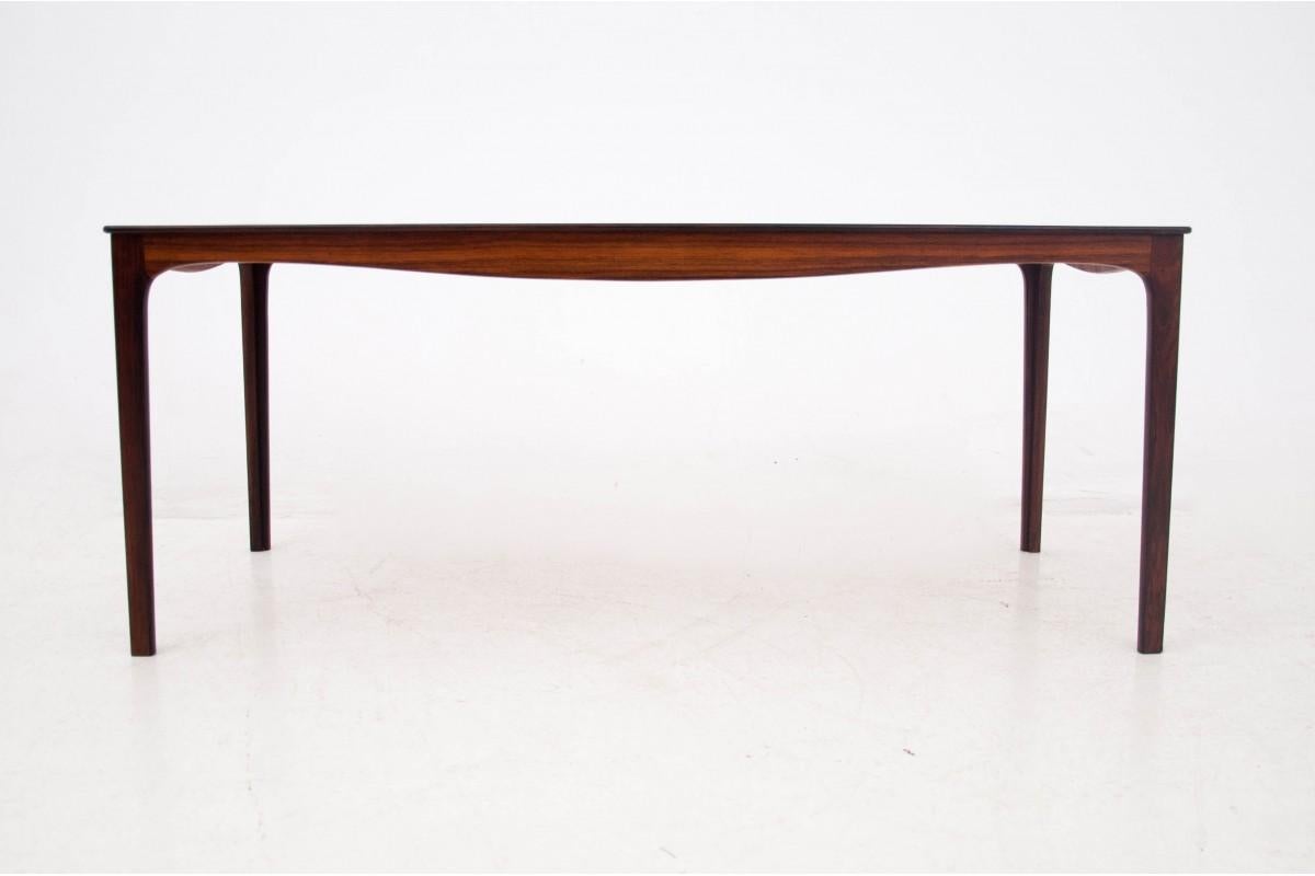 Rosewood table, Denmark, 1960s.

A table with a beautiful minimalist form. The whole is diversified by the profiled table cover. The piece of furniture will fit perfectly into contemporary interiors.

Very good condition, after professional