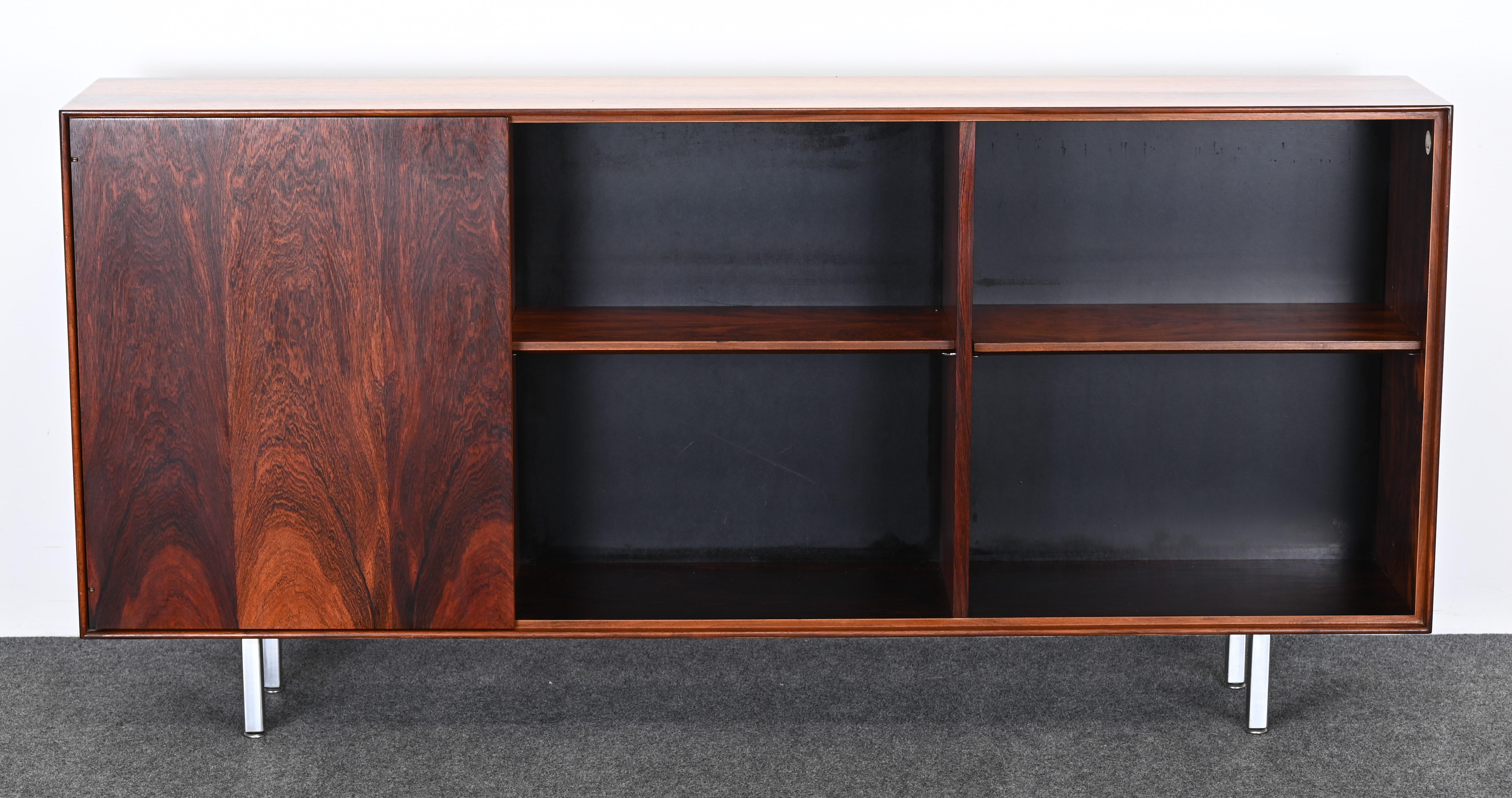 A beautiful rare and hard-to-find Rosewood Thin Edge bookcase by George Nelson for Herman Miller. The Thin Edge bookcase would look great in any Mid-Century Modern or Contemporary home or interior. It is a great piece for the George Nelson