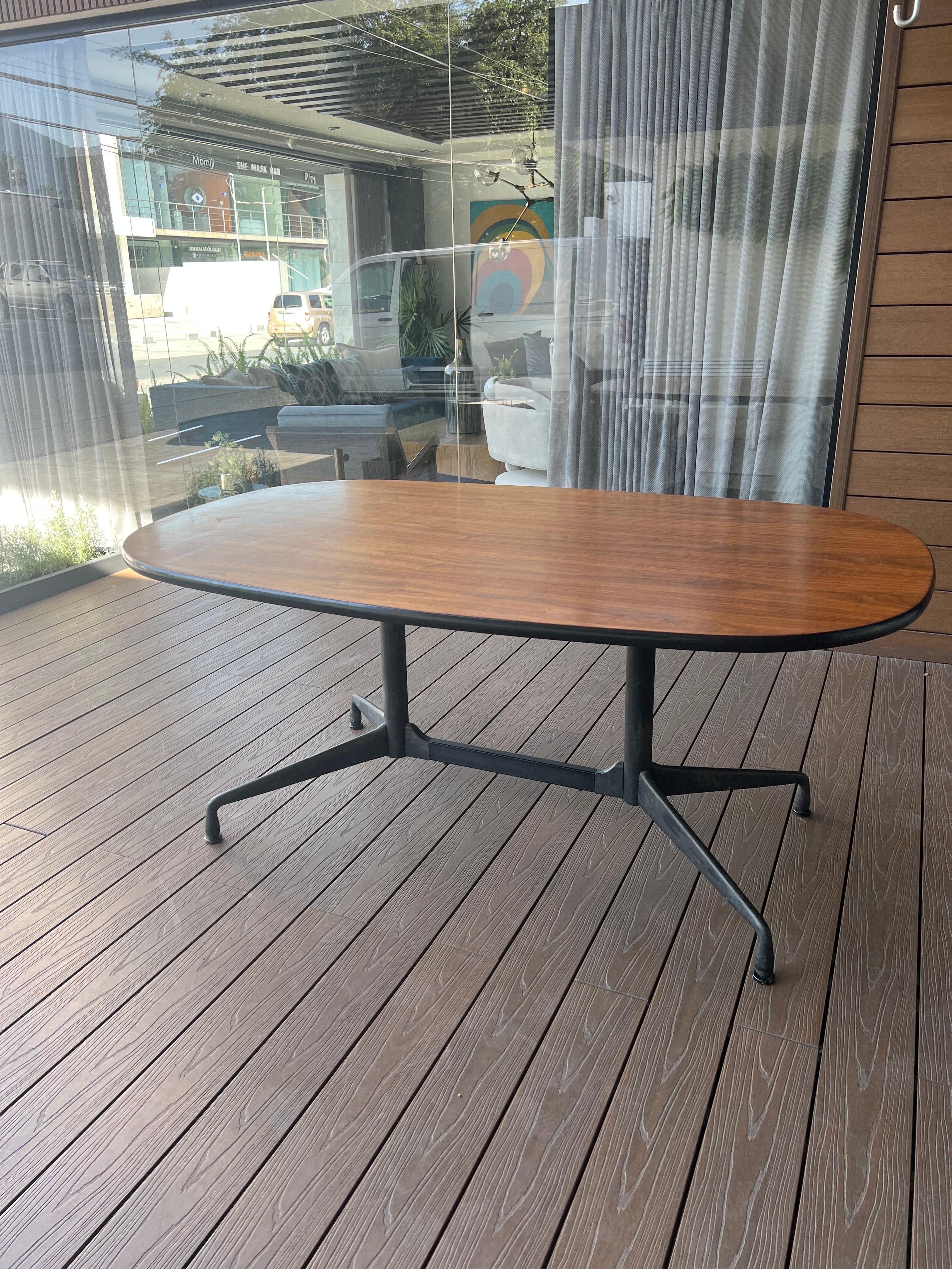 Rosewood top Aluminum Group Conference Table, missing a padded leg.