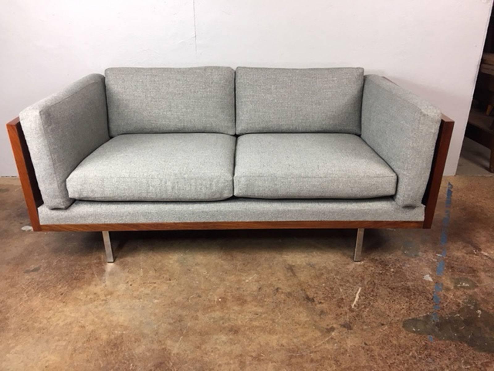 Unique rosewood wrapped low back sofa with chrome legs by Komfort of Denmark. Rare.  New upholstery.  Circa 1970s.  
