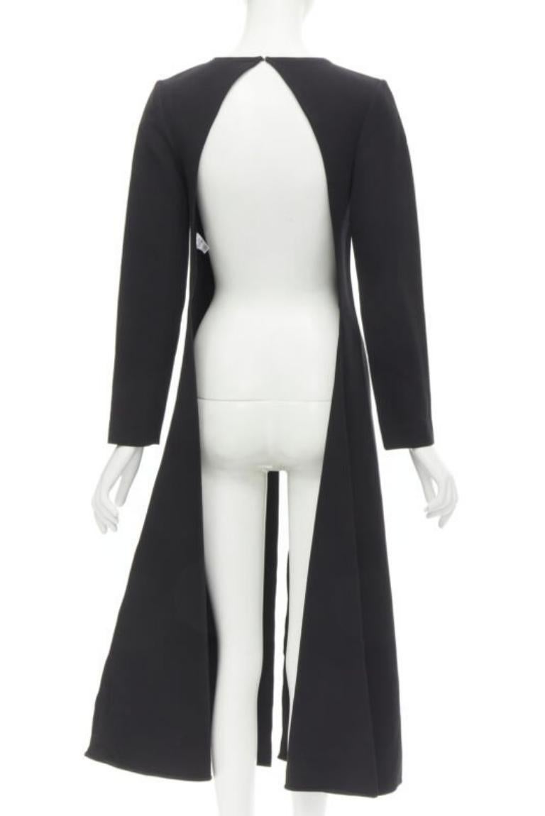 ROSIE ASSOULIN black long sleeves front slit backless tunic top US2 XS
Reference: KEDG/A00086
Brand: Rosie Assoulin
Material: Cotton
Color: Black
Pattern: Solid
Closure: Hook & Eye
Extra Details: Single hook and eye closure at back. Completely