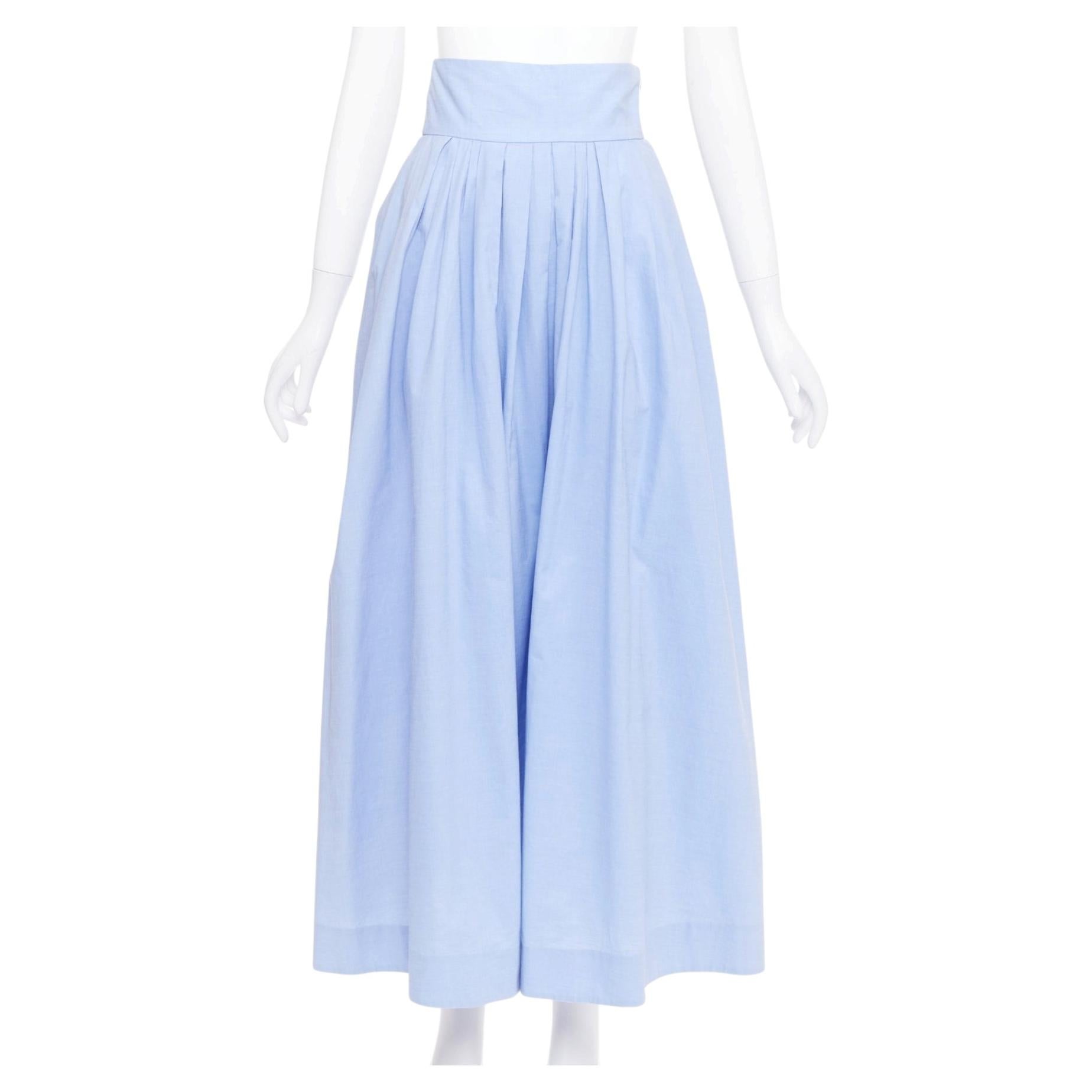 ROSIE ASSOULIN: falda midi de algodón azul claro con aberturas en la espalda y pliegues, talla XS (EE. UU.)