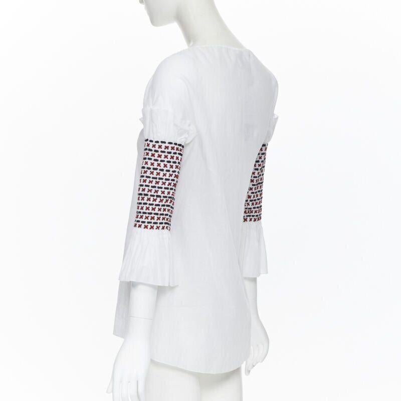 ROSIE ASSOULIN white ethnic embroidery smocked sleeves off shoulder top US4 For Sale 1