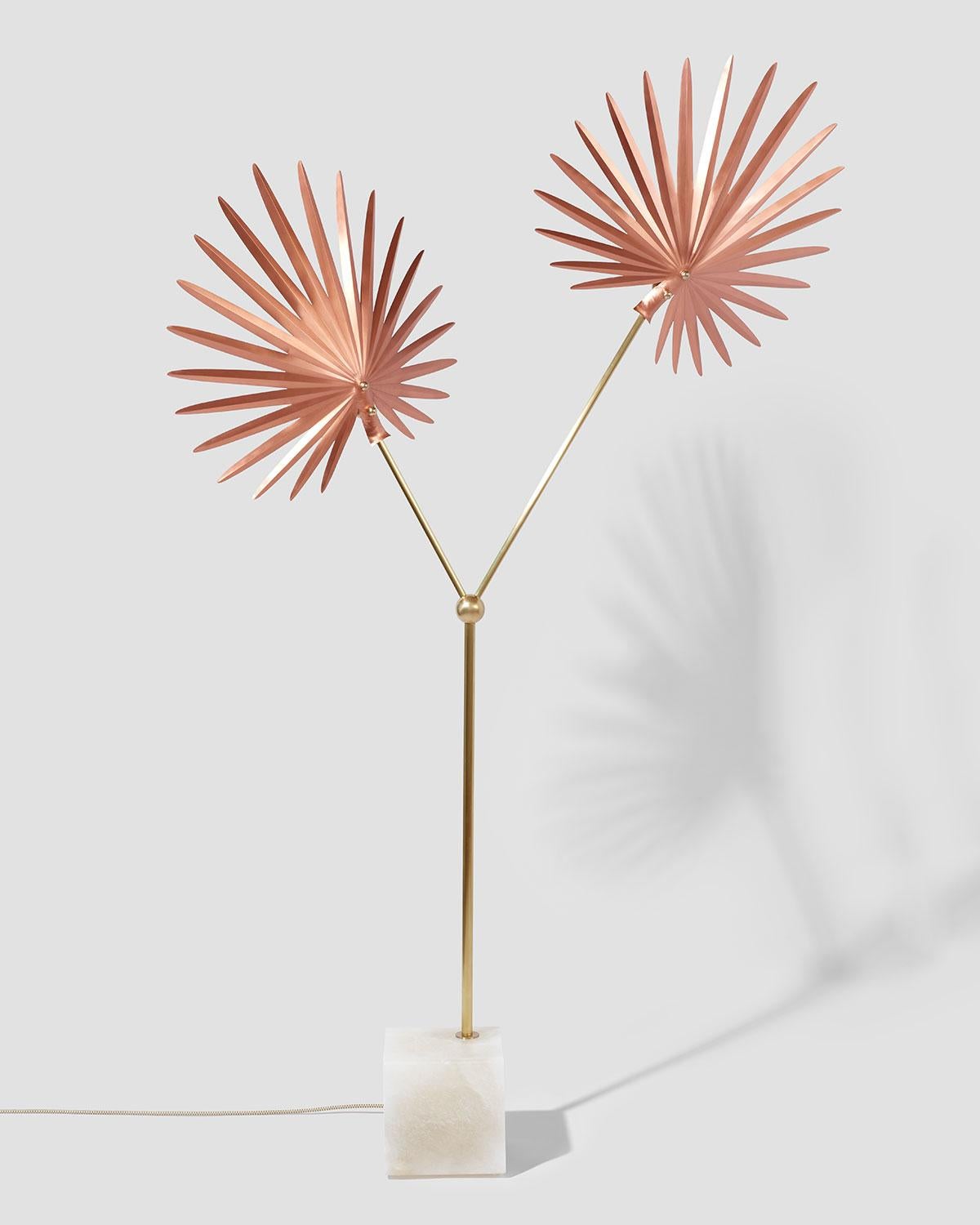 Tall, organic tree-like floor lamp made of folded and hammered copper shades, satin brass stem, a carved white Spanish alabaster base, and premium Tala ceramic LED bulbs, from Rosie Li's 2018 