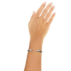 Pulsera brazalete Rosior engastada en oro blanco y amarillo con diamantes