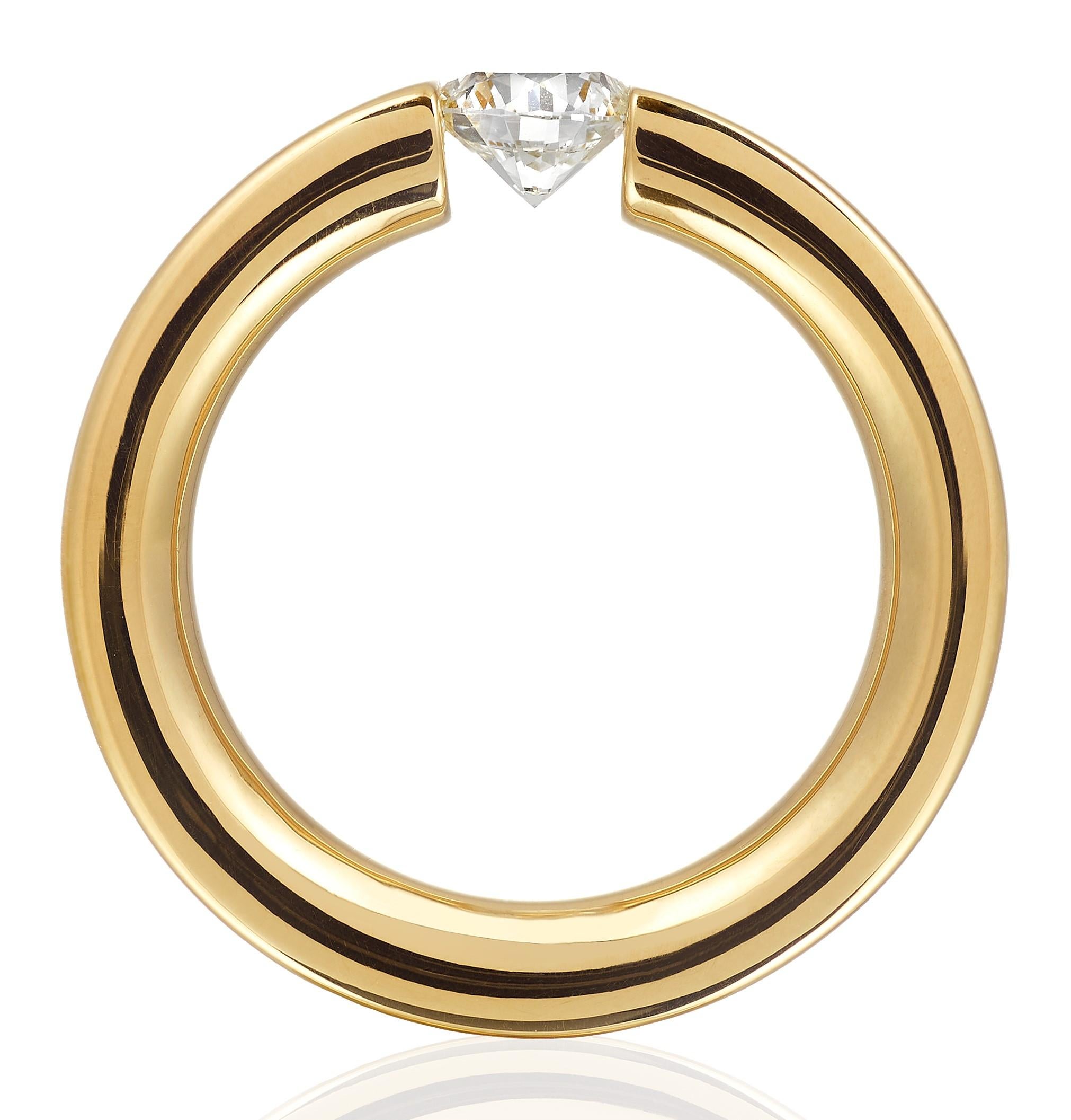 Contemporary Tension Set Diamond Ring set in Yellow Gold For Sale
