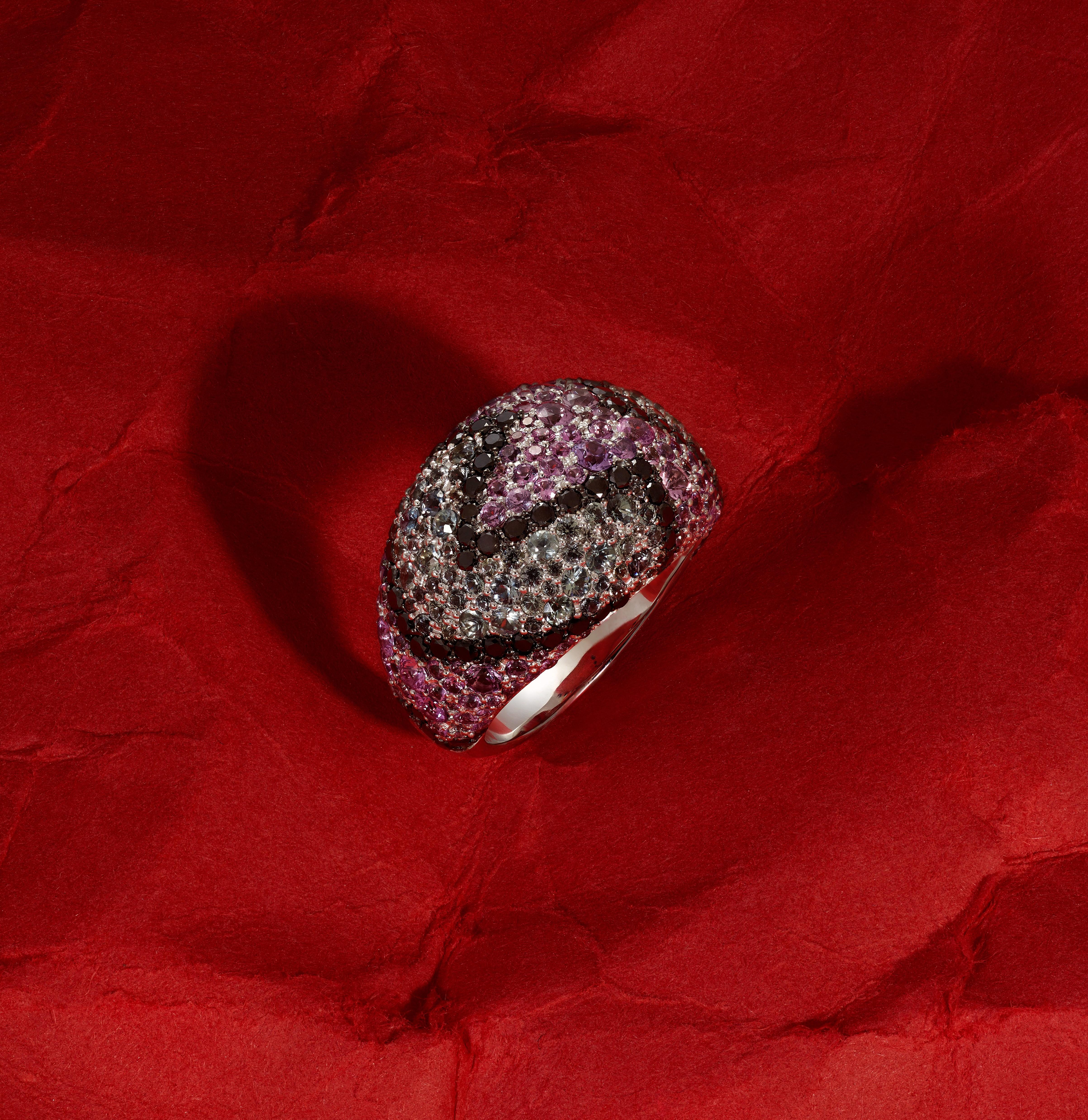 White Gold Ring with Black Diamonds, Purple and Light Green Sapphires. A Unique Creation by Rosior

A bold expression of contemporary luxury, this one-of-a-kind ring is handcrafted in white gold and set with an extraordinary array of gemstones: 76