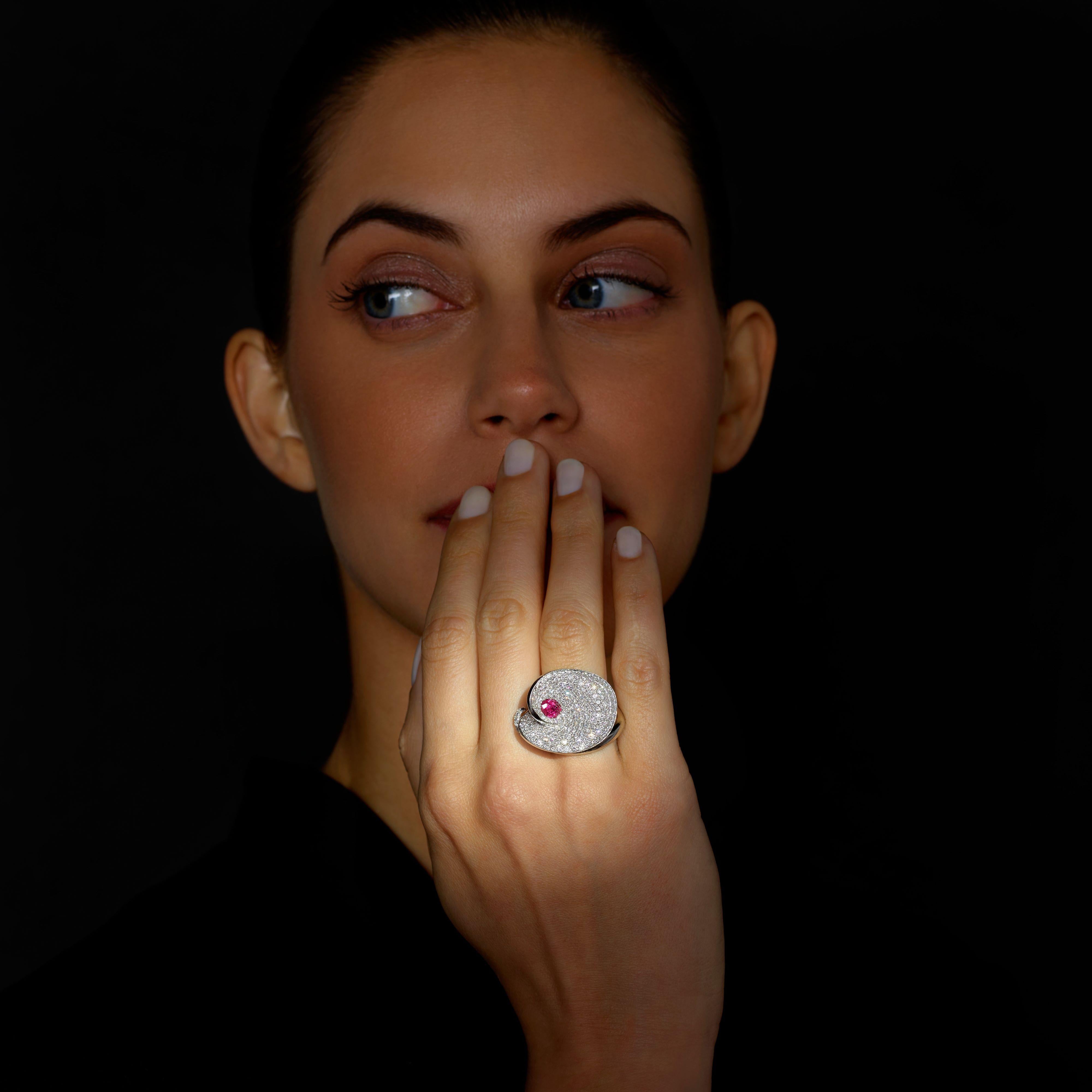 Rosior by Manuel Rosas Contemporary Cocktail Ring set in White Gold with:
- 1 Oval cut Ruby with 0,59 ct;
- 202 F/G, VVS, Diamonds with 2,88 ct.
This unique piece comes with a Certificate of Authenticity. 
Stamps include the Rosior hallmark and