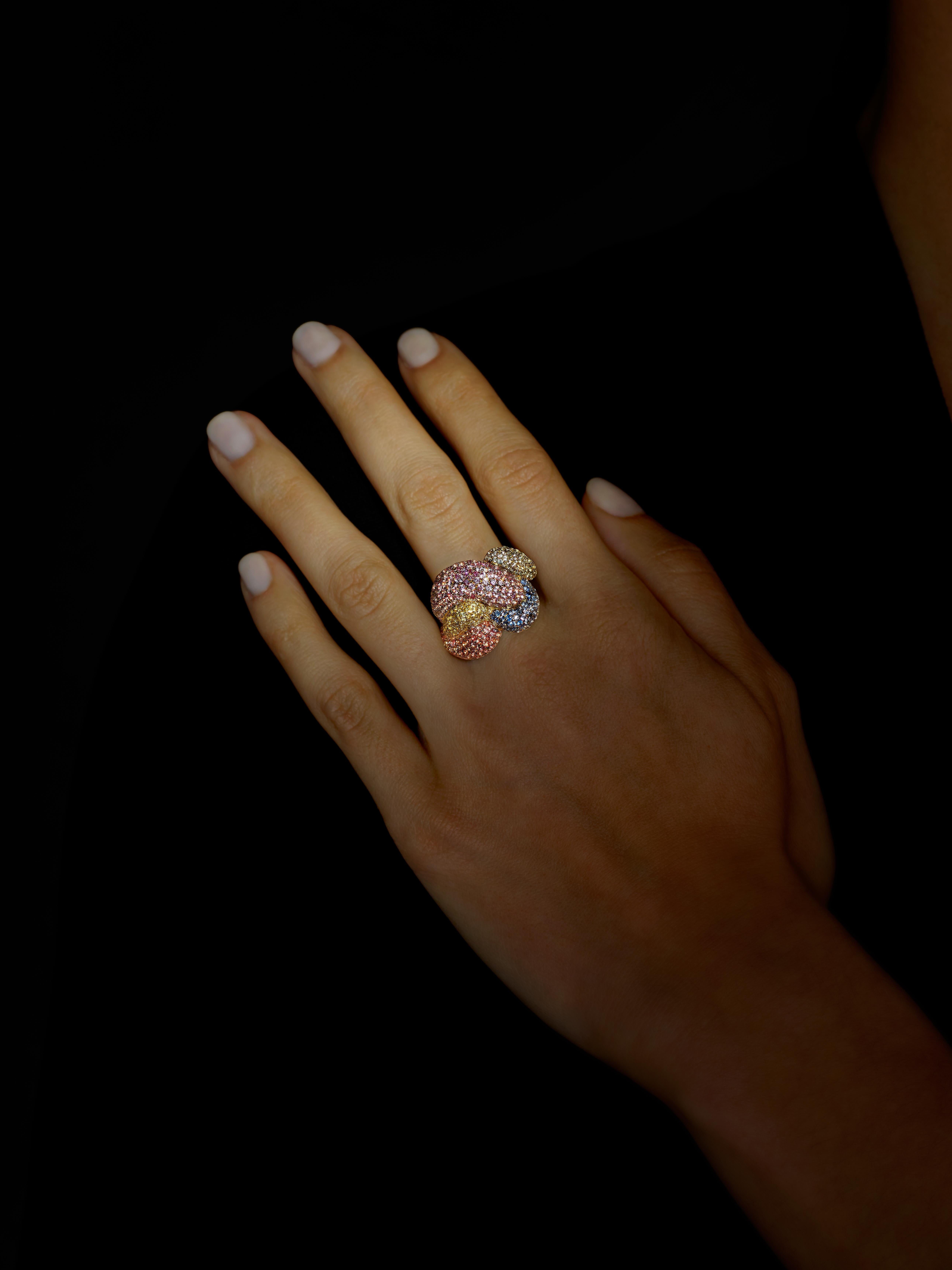 An unique piece by portuguese jeweller Rosior, this Cocktail Ring is set in Yellow Gold with:
- 98 Purple Sapphires weighing 1,62 ct; 
- 74 Orange Sapphires weighing 1,42 ct; 
- 71 Yellow Sapphires weighing 0,43 ct; 
- 66 Green Sapphires weighing