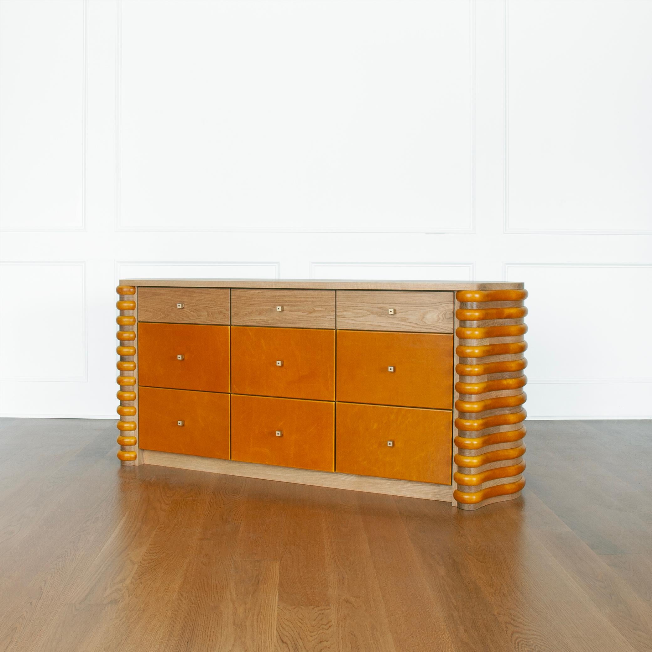 American Roslin Leather and Solid Wood Dresser by Crump and Kwash For Sale