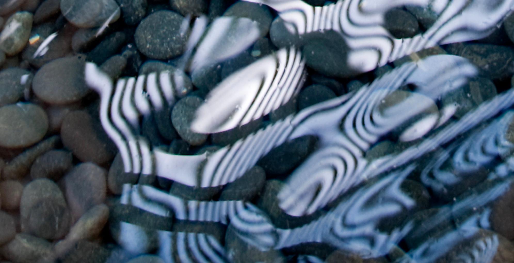 Stones and Swirls : nature photography - Photograph by Roslyn Meyer