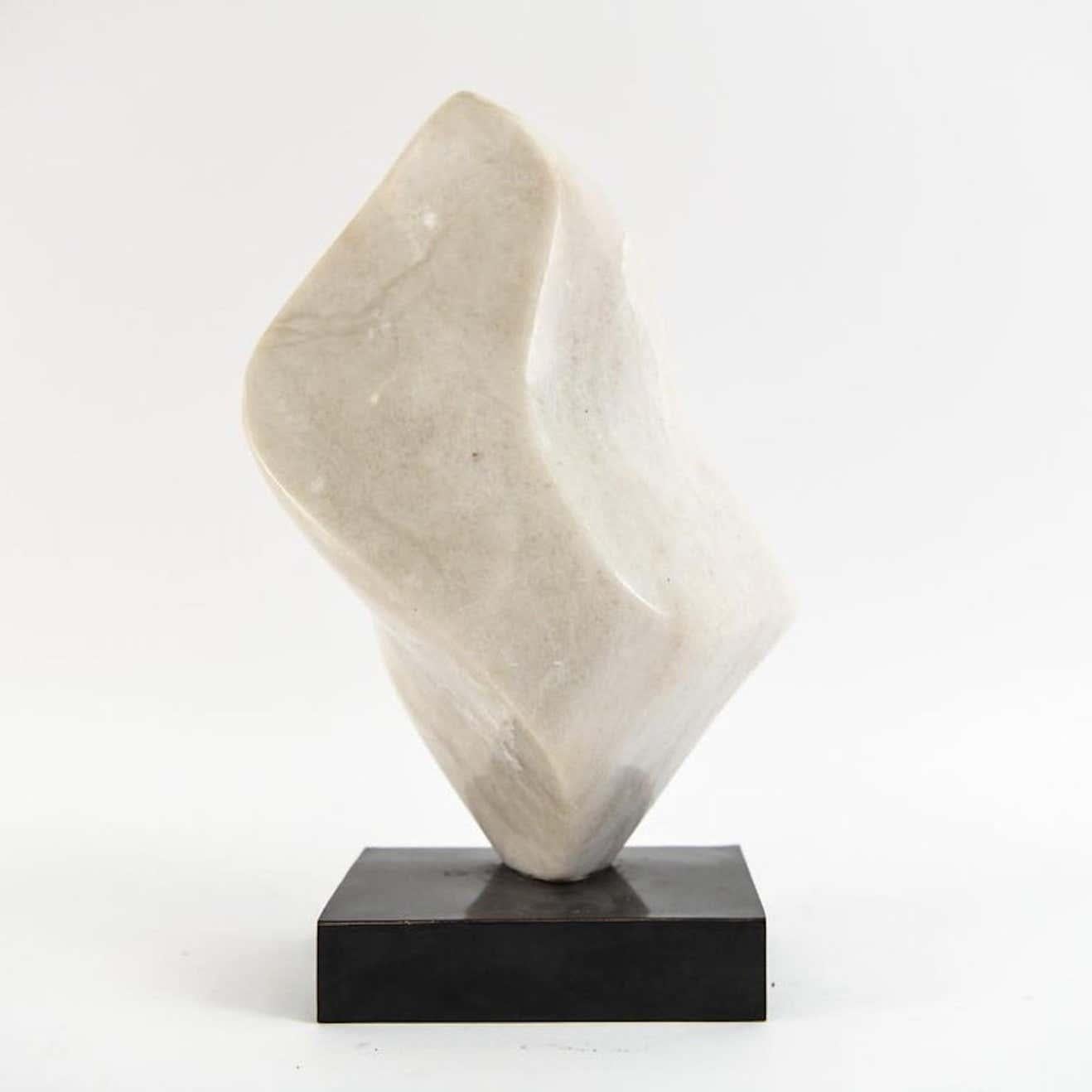 Organic contemporary abstract alabaster sculpture by Ross de Matteo (1914 - 2004) Upright wave shape with dramatic flow. It is perfect for a bookcase or on display on a pedestal.