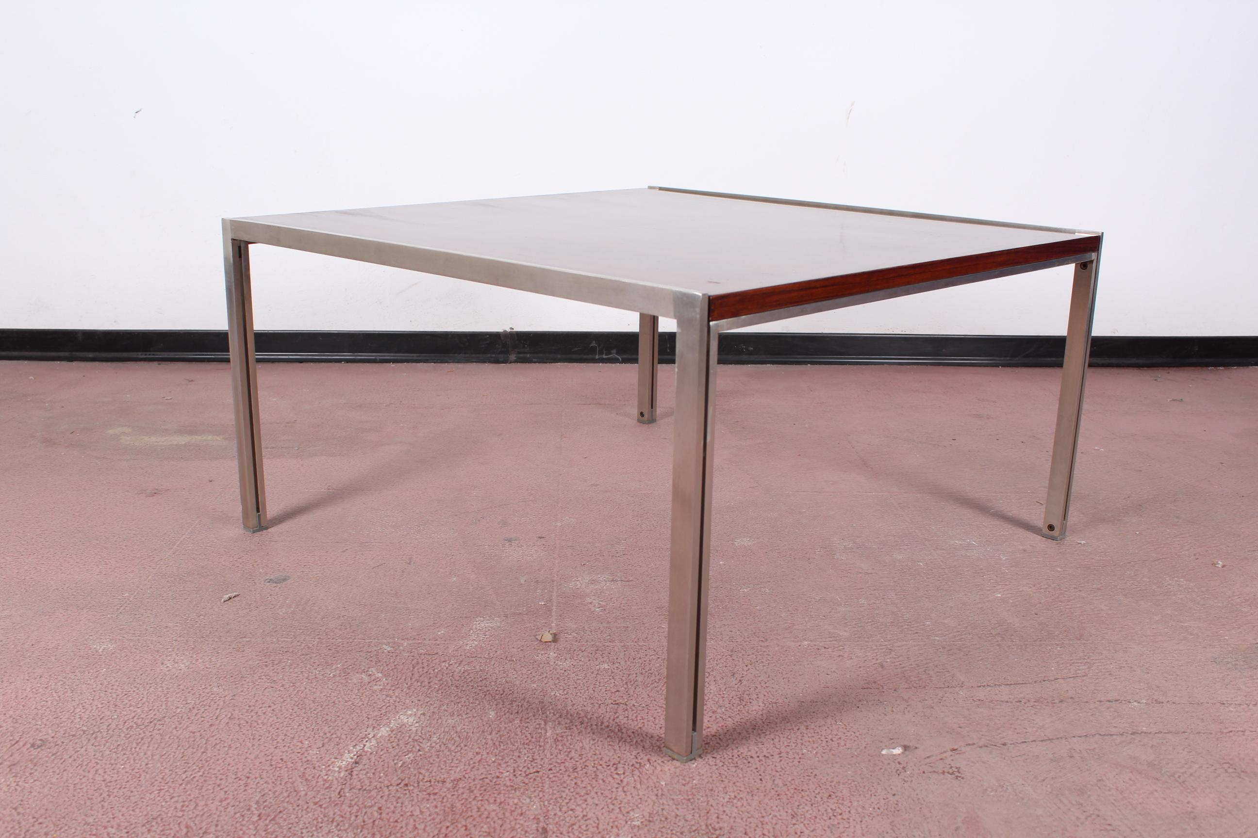 Beautiful brown wood and chromed metal frame square coffee table attributed to Ross Littel for ICF Padova, Italy, 1970.
Wear consistent with age and use.
 
